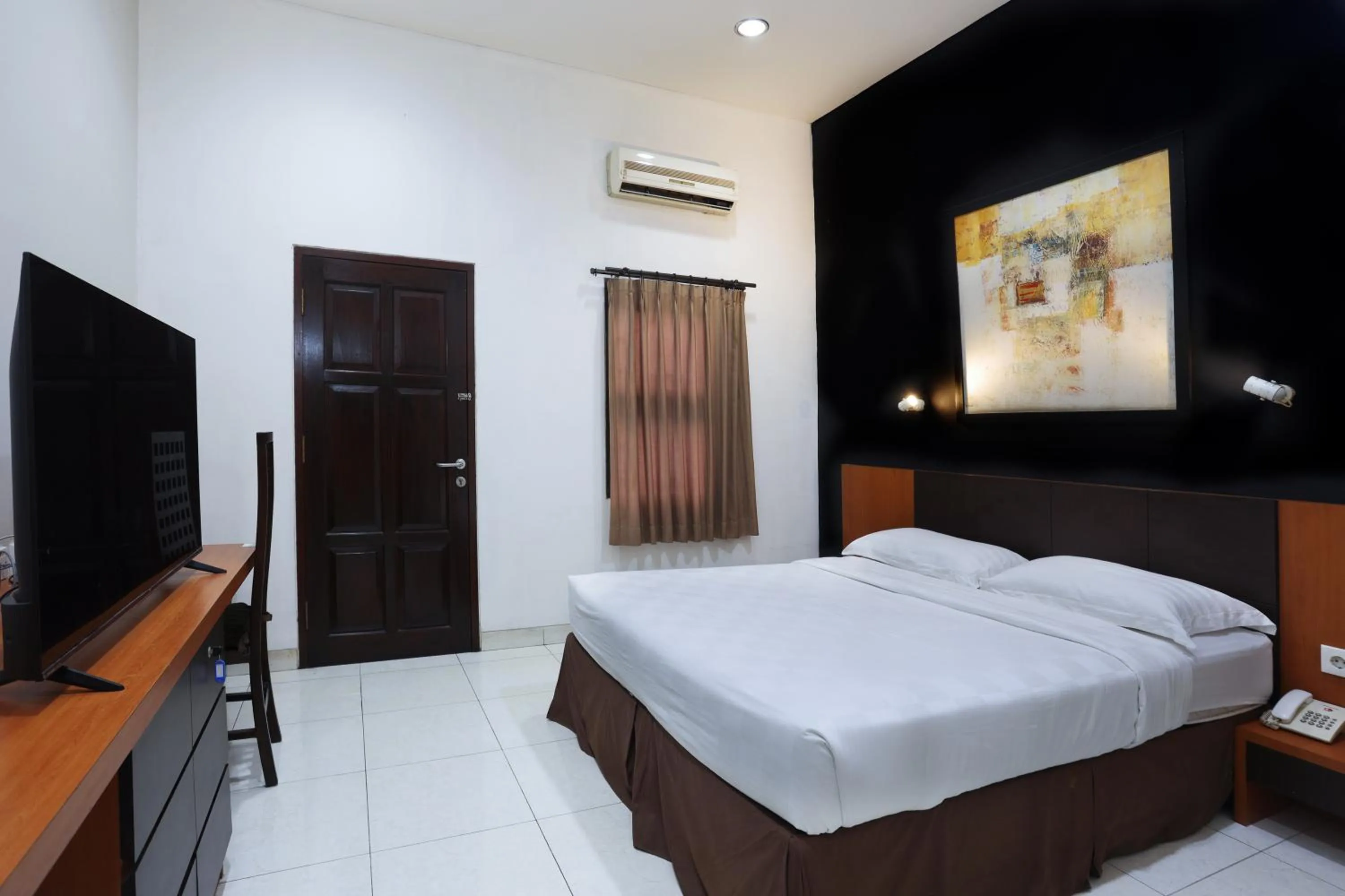 Bed in Jambuluwuk Residence Menteng
