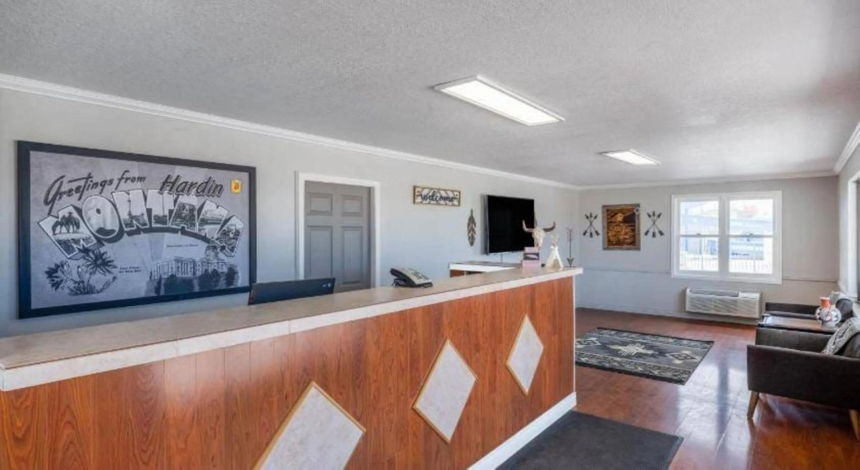 Lobby or reception in Hardin Lodge By Capital O Little Bighorn Battlefield I-90