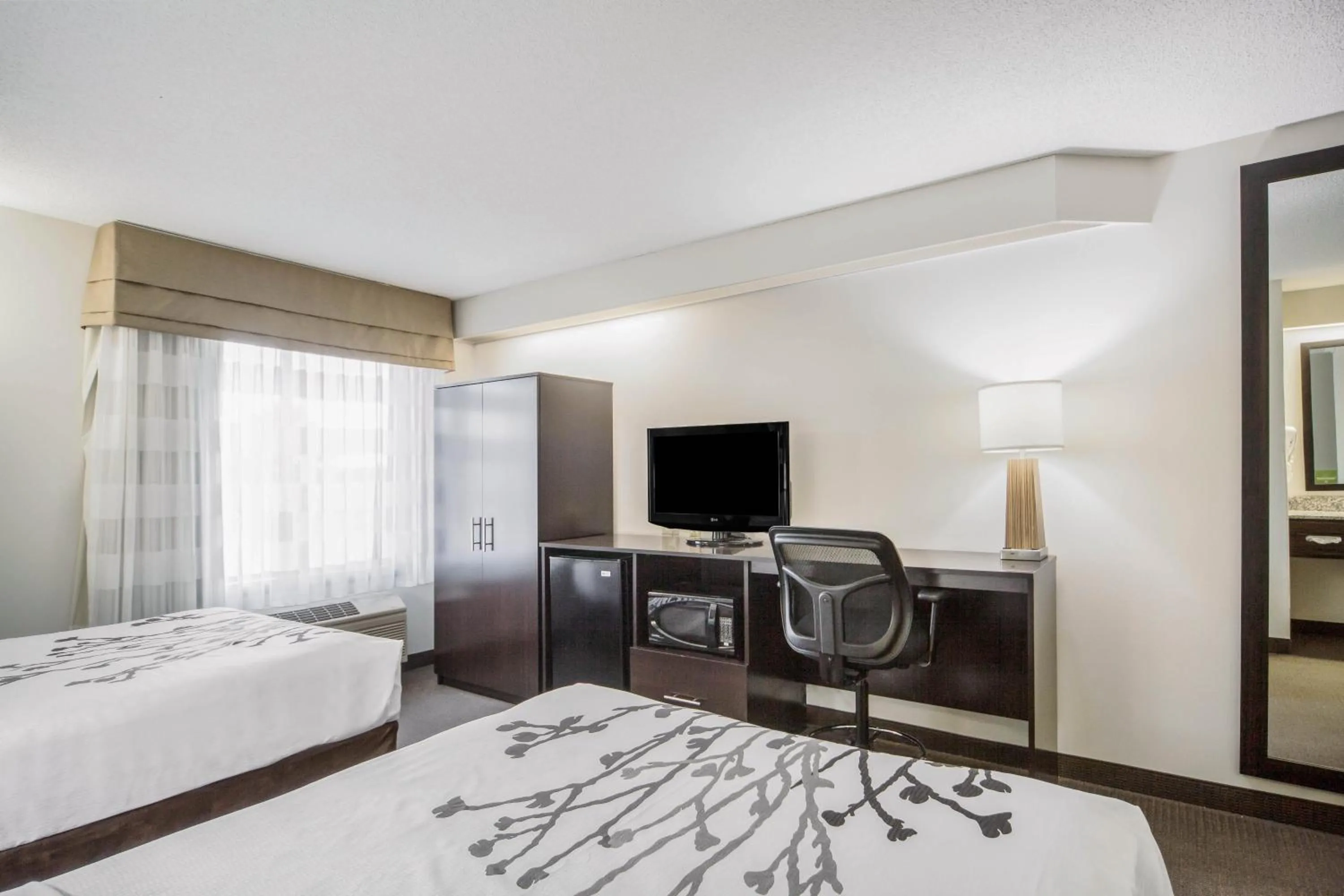 Bed in Sleep Inn & Suites Columbus, NE