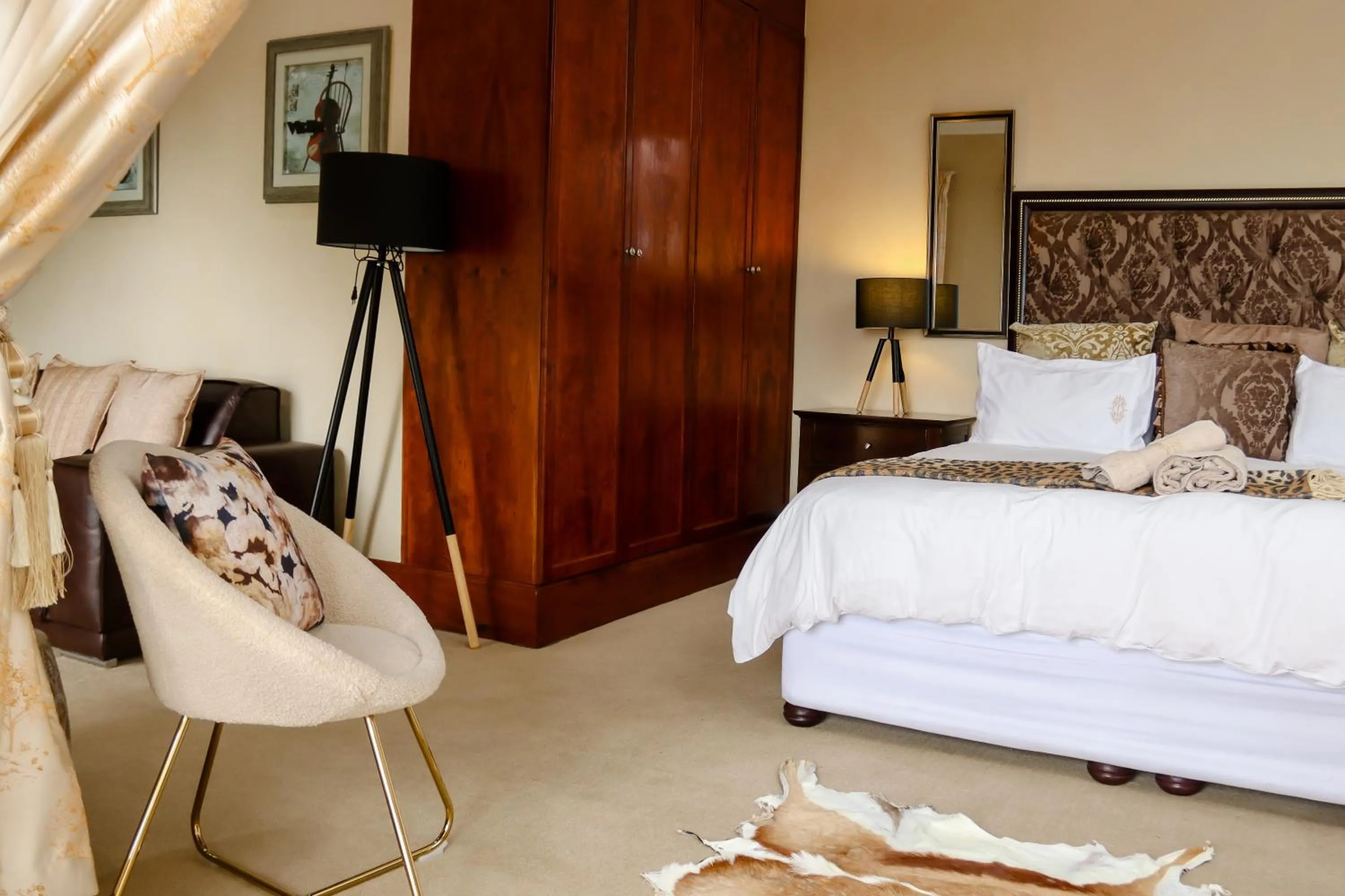 Seating area, Bed in TDM's Boutique Guest House