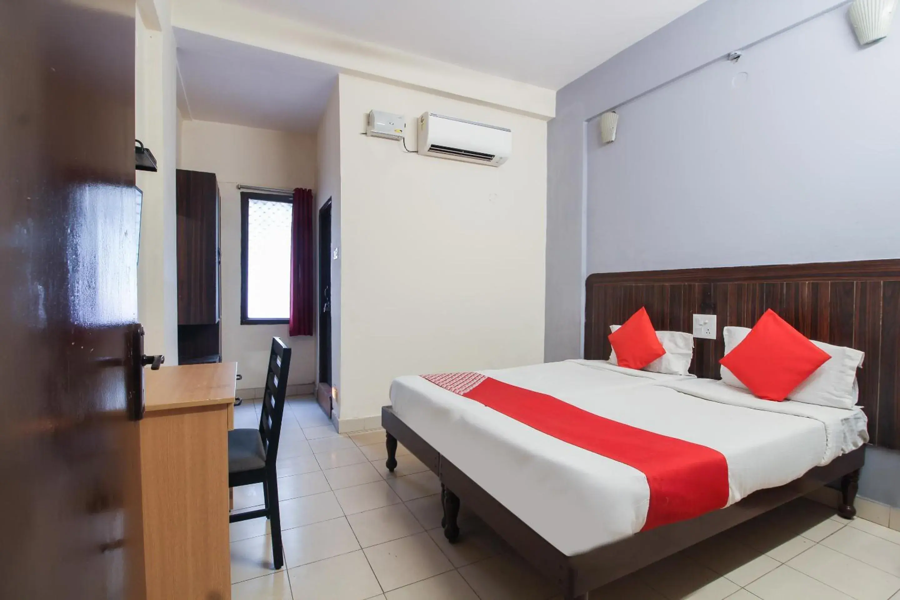 Classic Triple Room - single occupancy in Hotel O Regal Near Paradise Circle Classic Triple Room - single occupancy in Hotel O Regal Near Paradise Circle