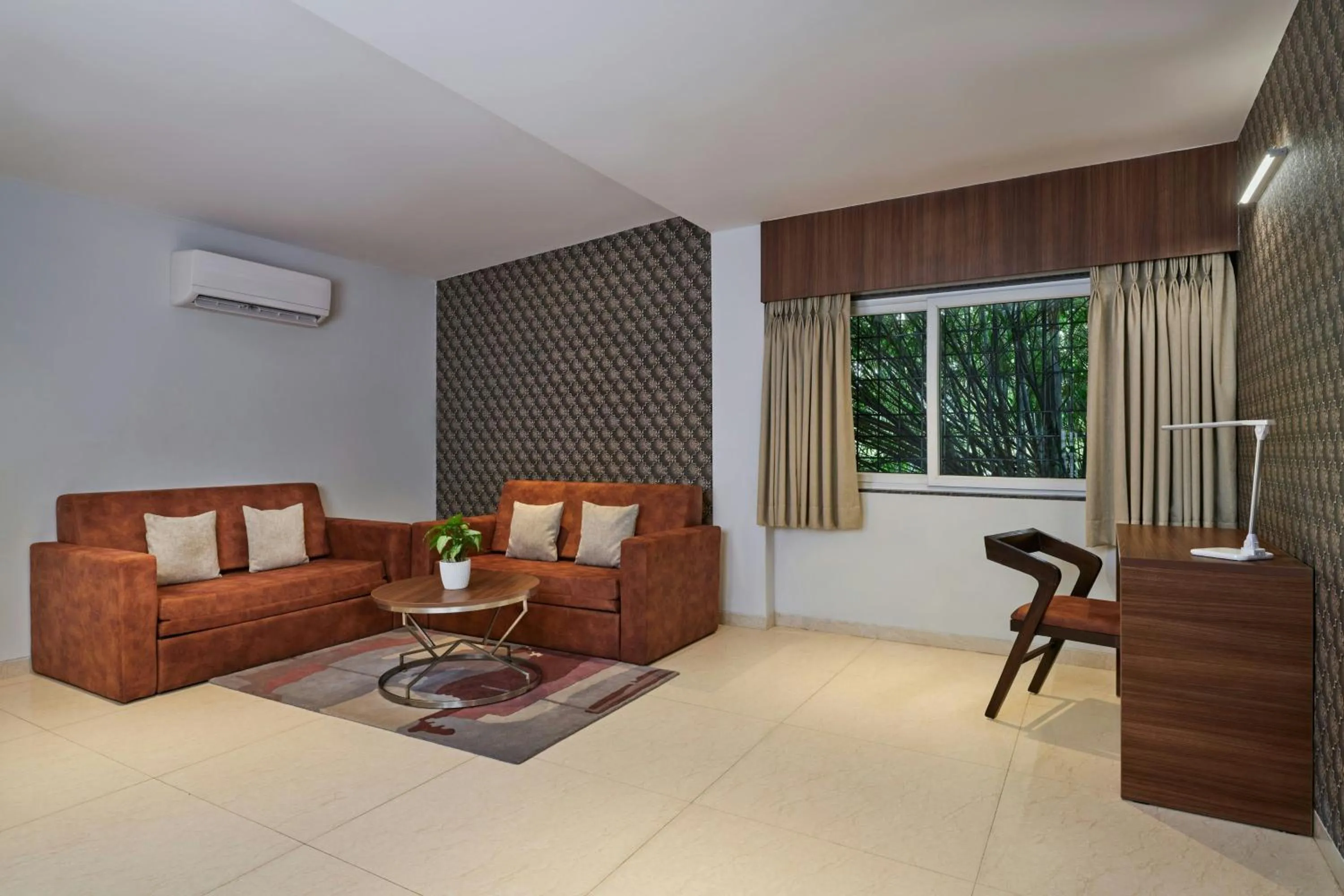 Living room in The Fern Sardar Sarovar Resort Kevadia, Gujarat, Series by Marriott