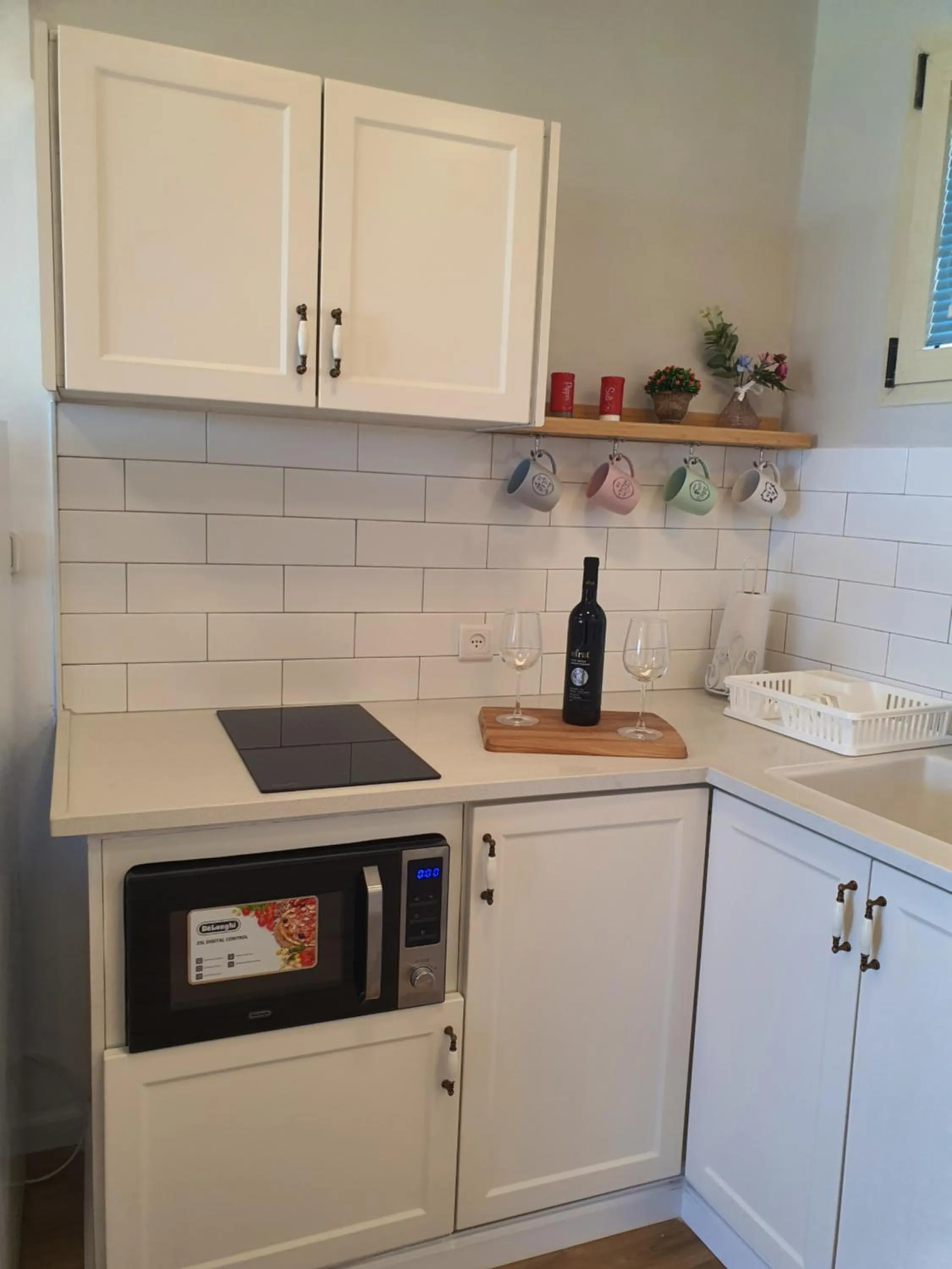 Kitchen or kitchenette in Boutique Apartments Caesarea