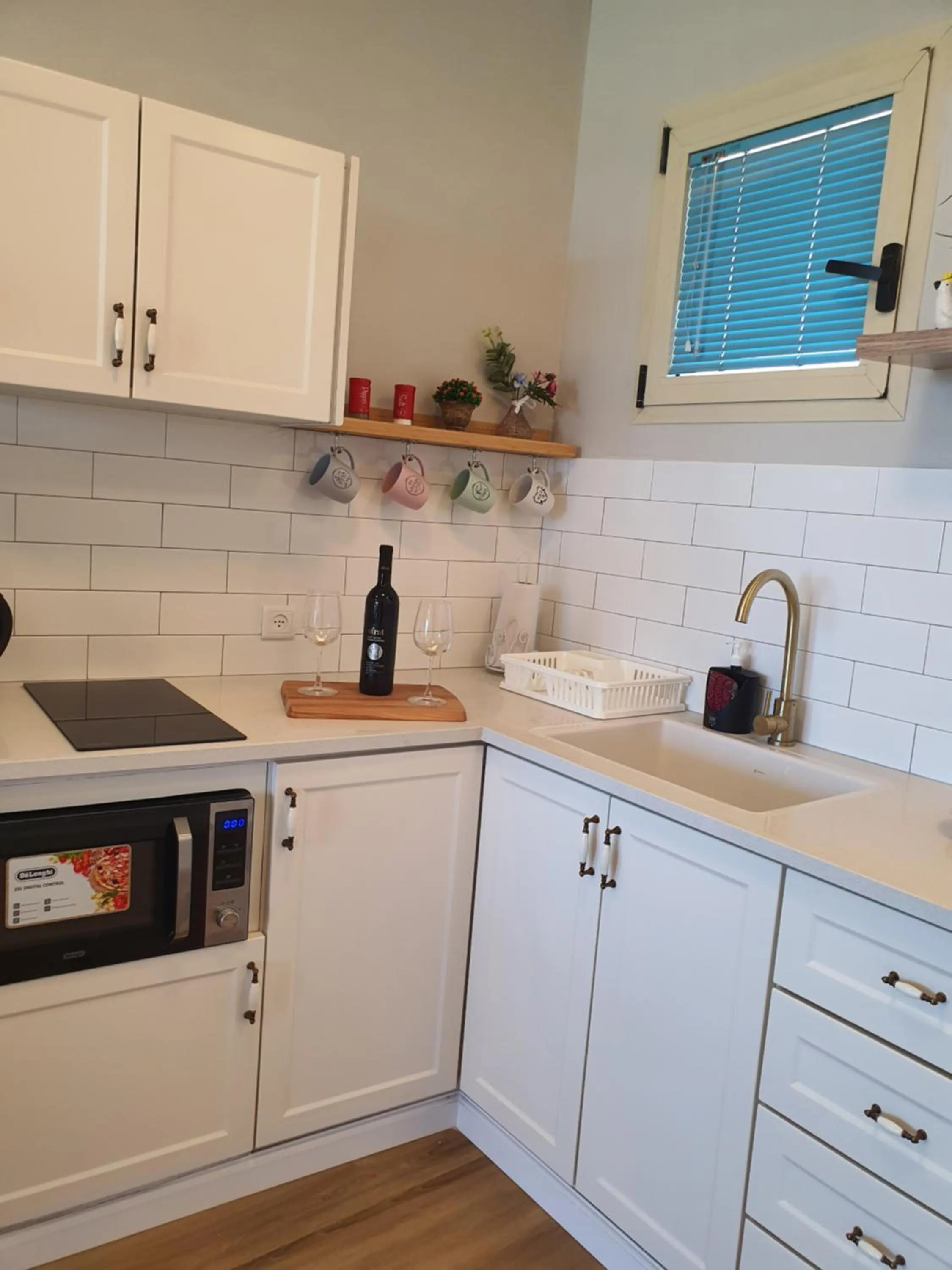 Kitchen or kitchenette in Boutique Apartments Caesarea