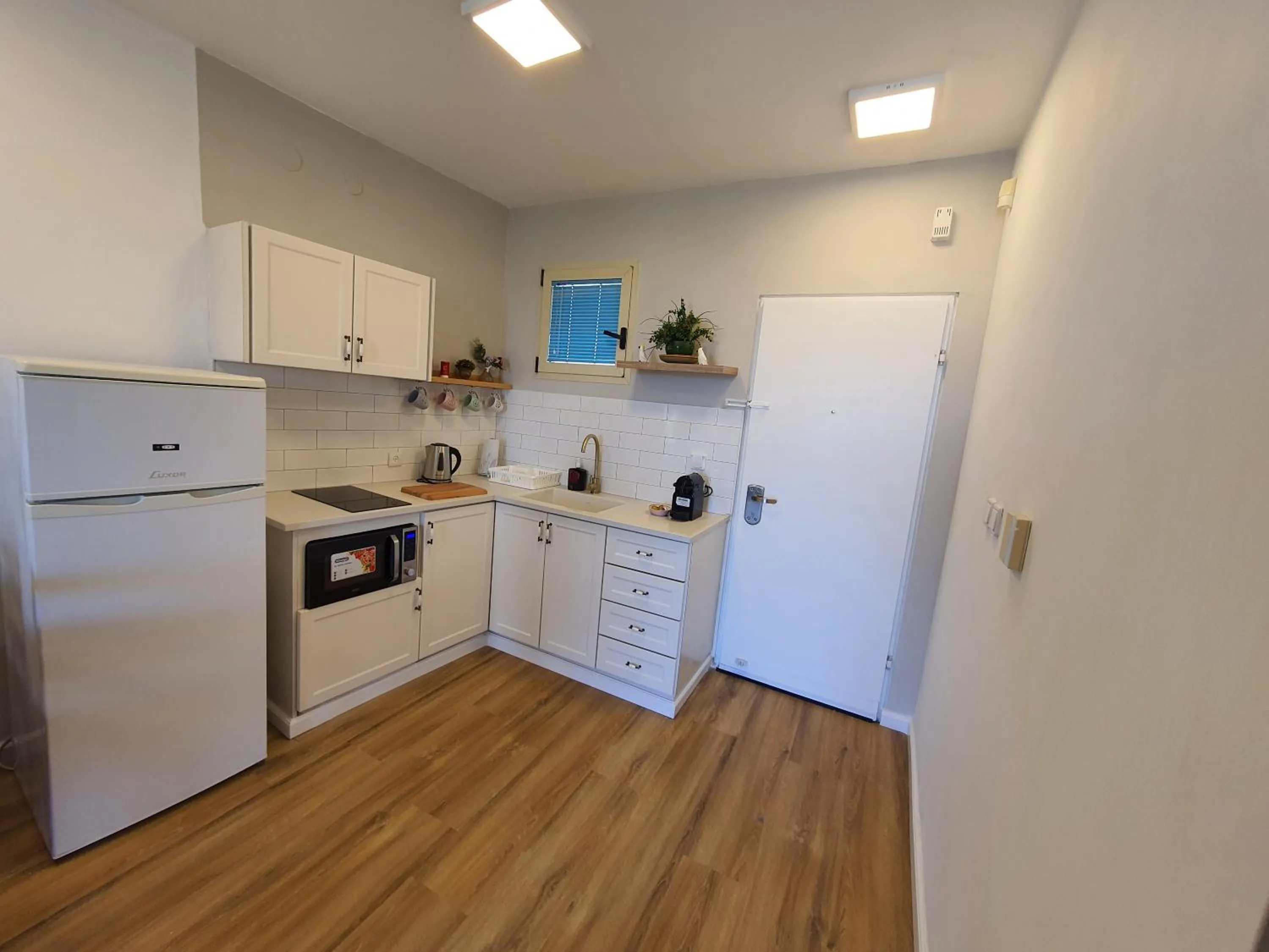 Kitchen or kitchenette in Boutique Apartments Caesarea