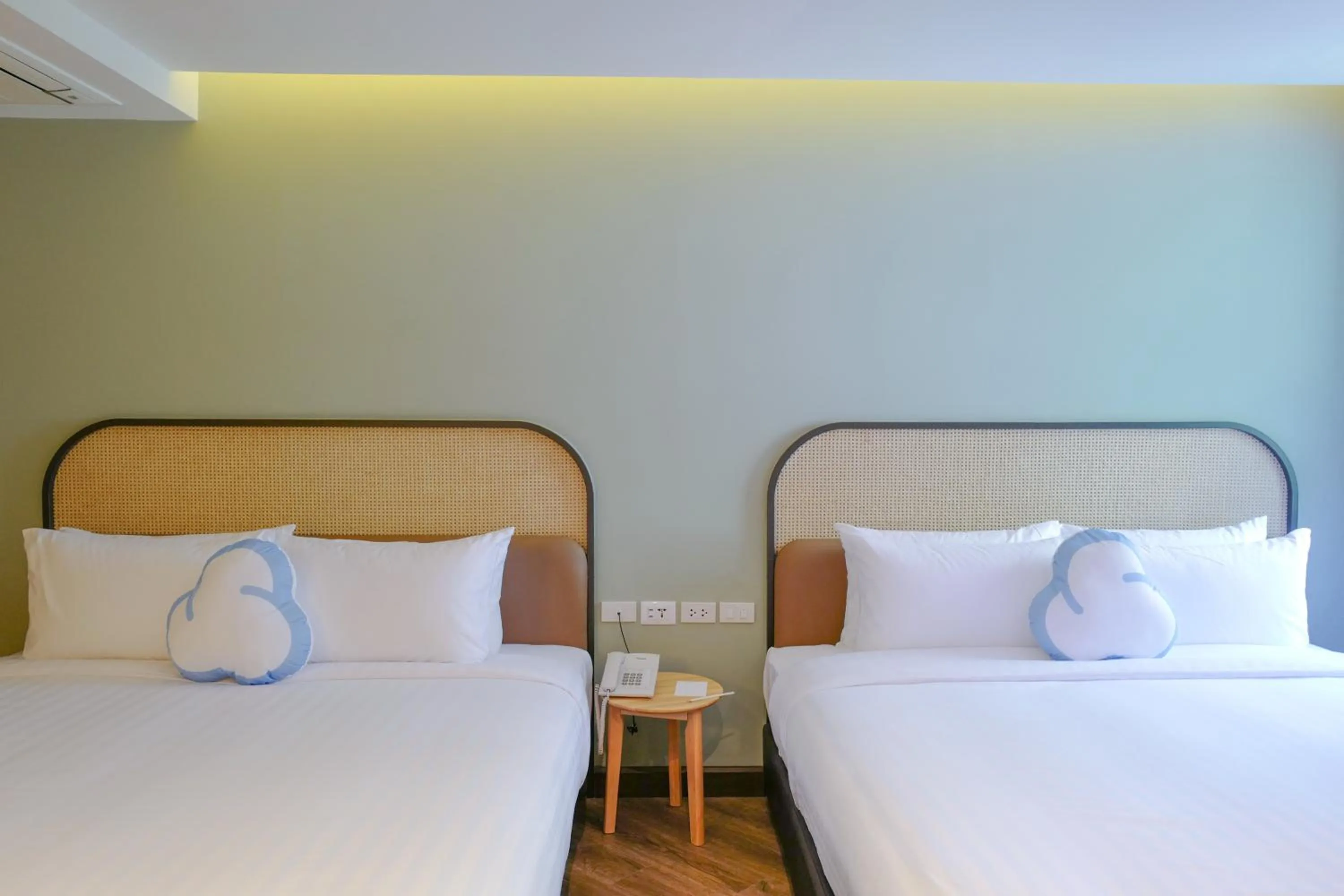 Bed in The Cotton Saladaeng Hotel