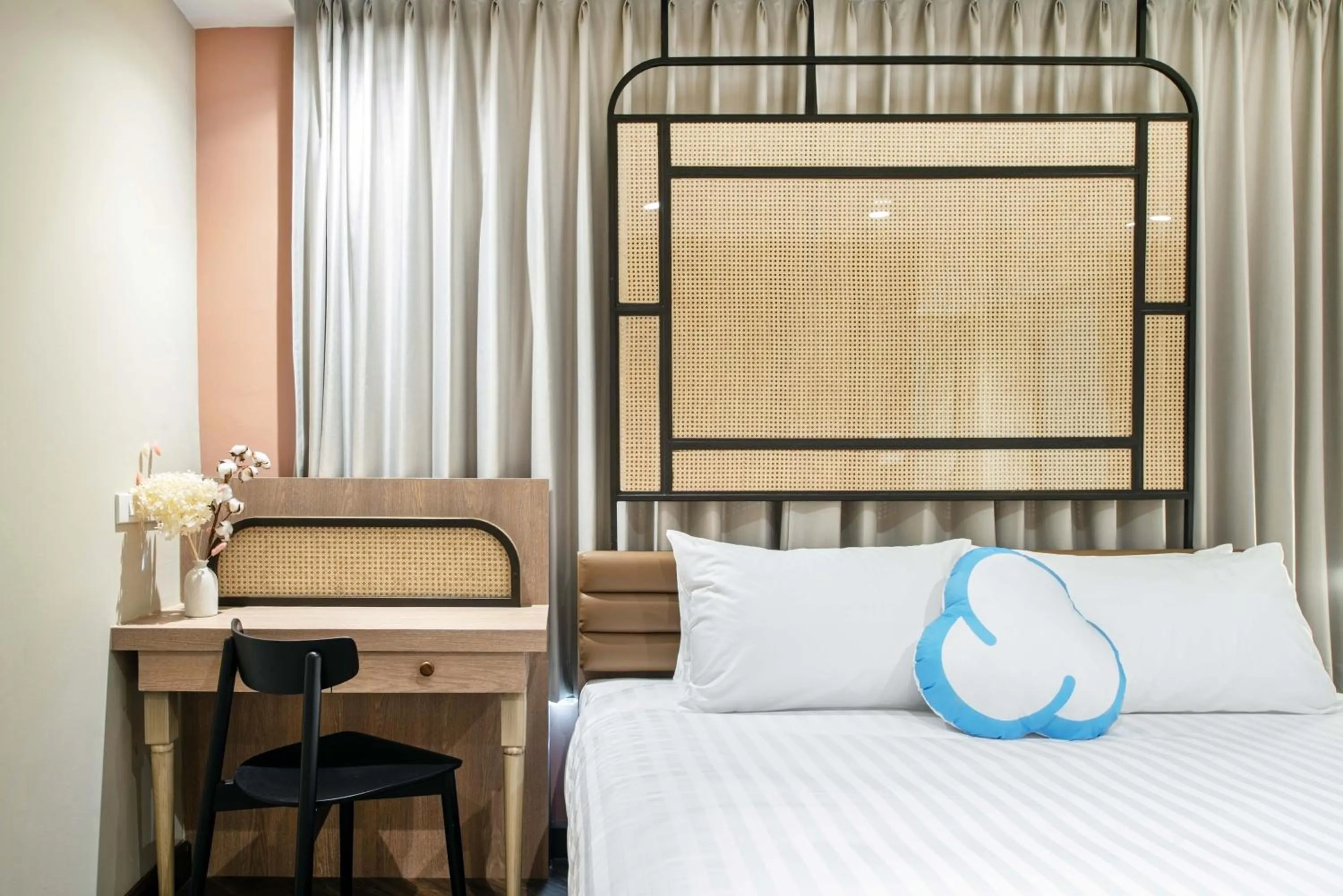 Bed in The Cotton Saladaeng Hotel