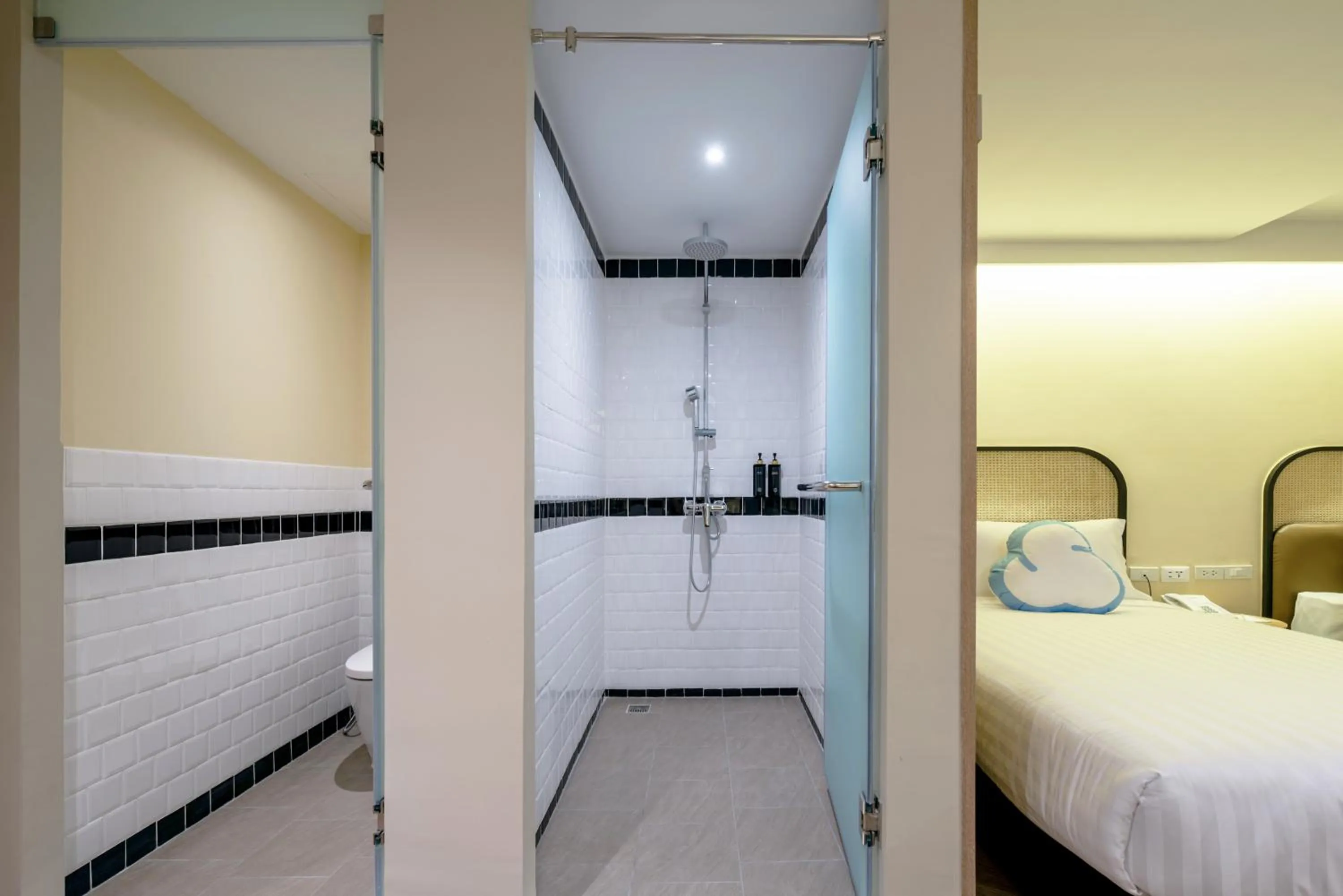 Bathroom, Bed in The Cotton Saladaeng Hotel