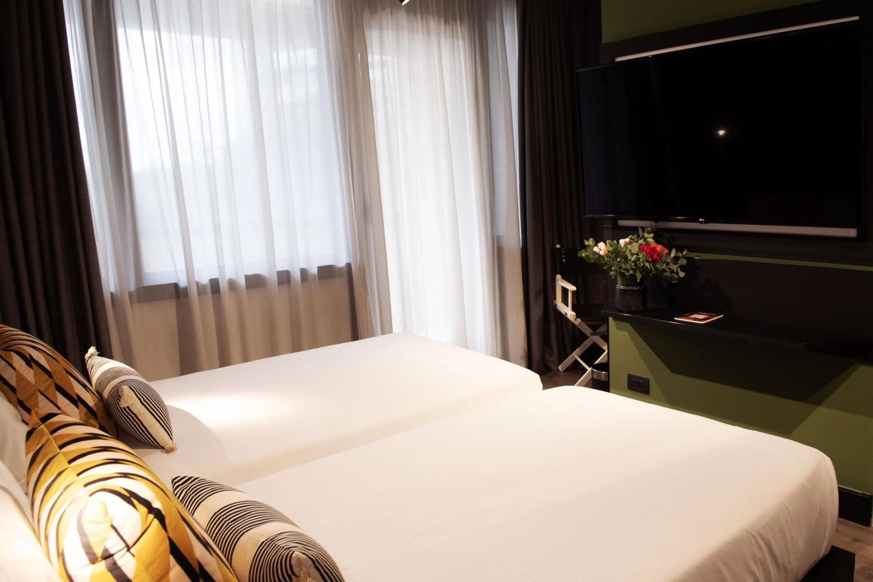 Bed in Mercure Roma Cinecitta