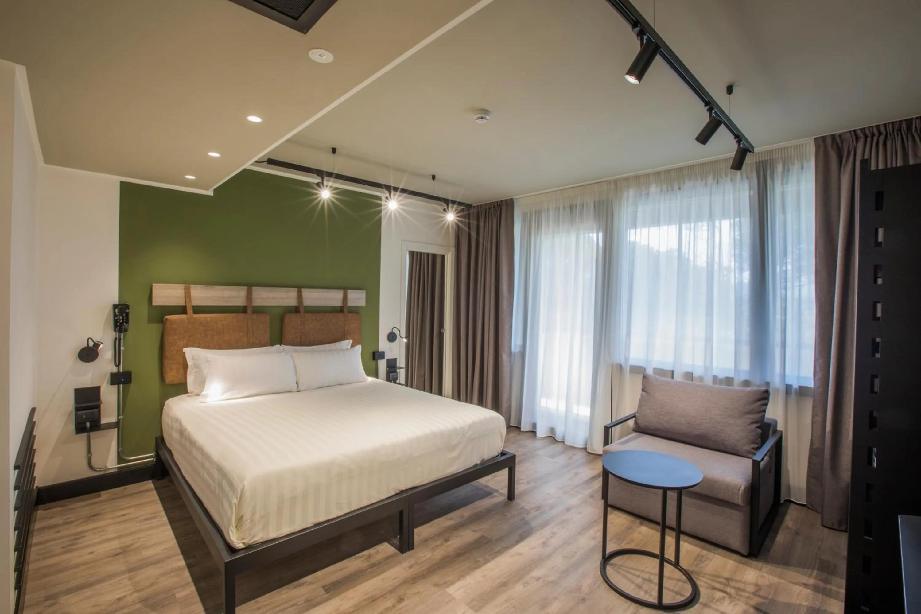 Bed in Mercure Roma Cinecitta