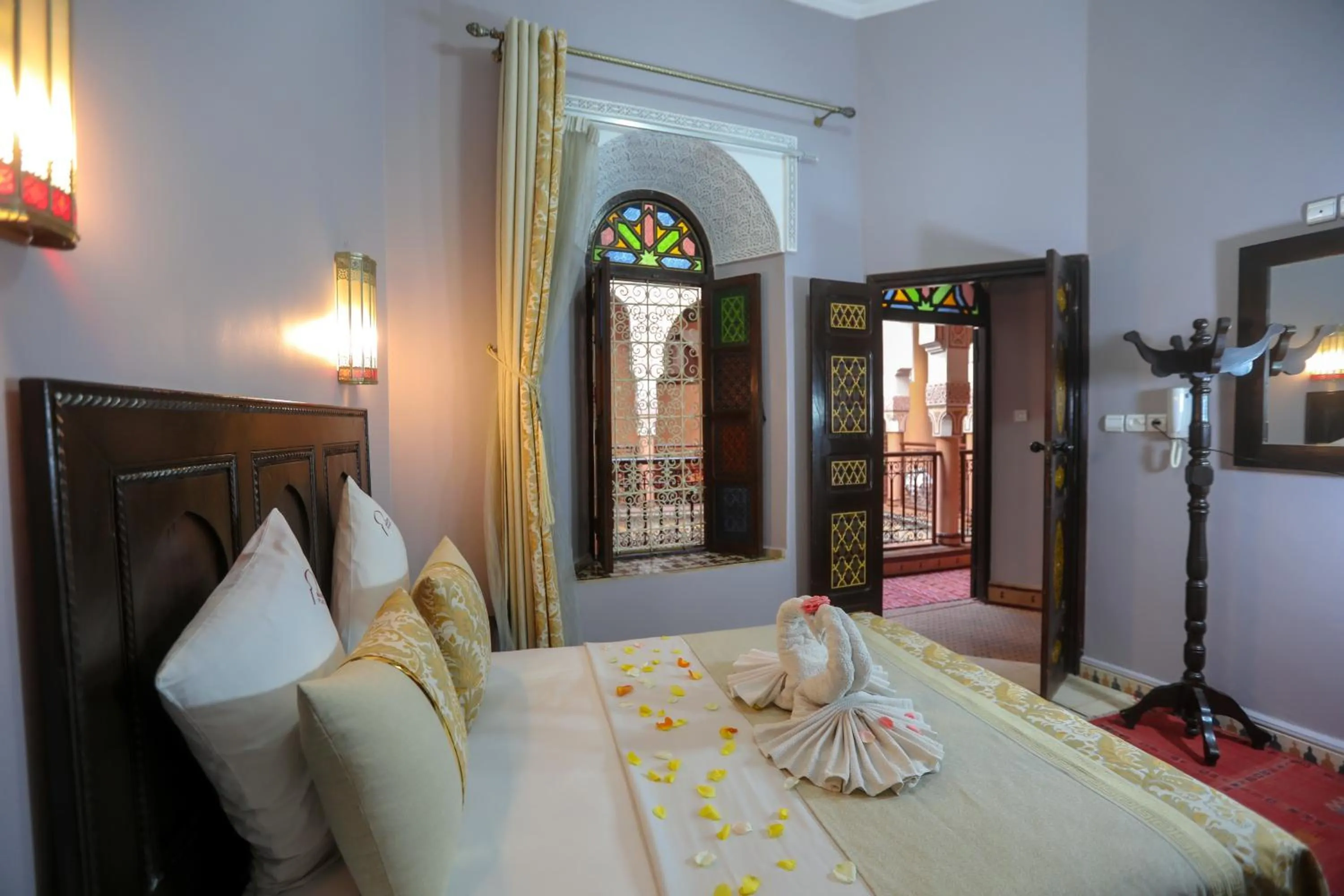 Bed in Riad Hôtel Marraplace