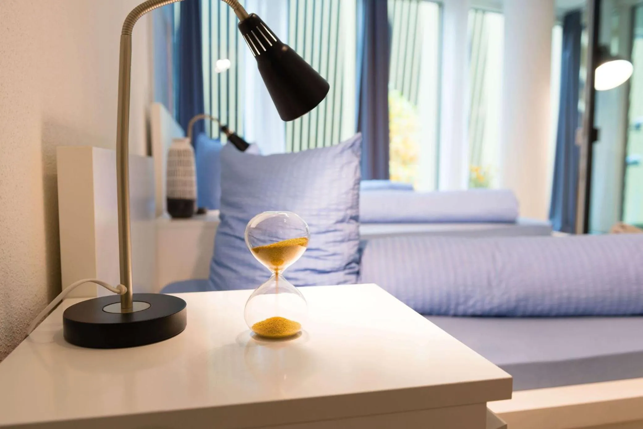 Bed in HITrental Allmend Comfort Studios