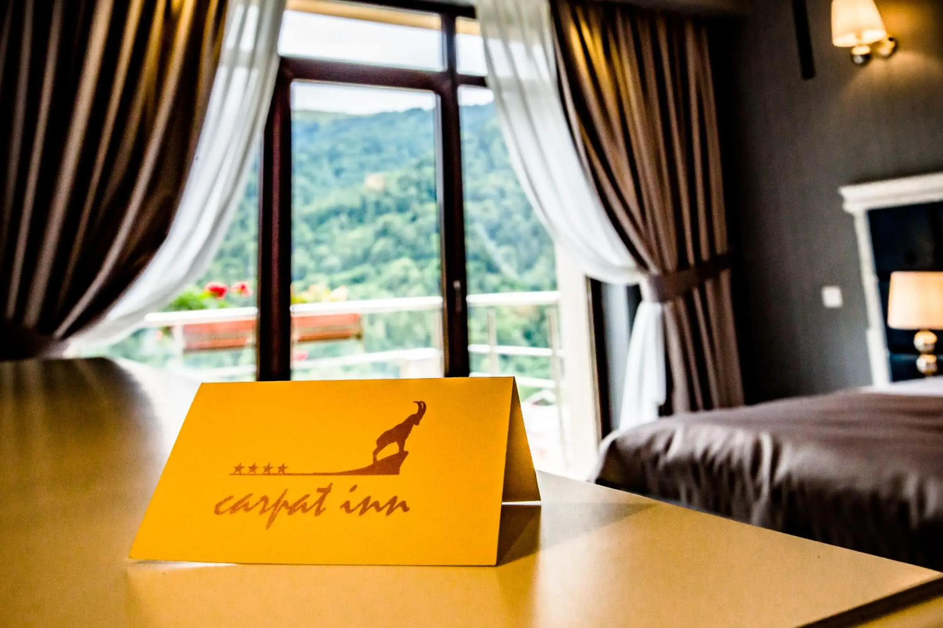 Property logo or sign, Bed in HOTEL CARPAT INN Property logo or sign, Bed in HOTEL CARPAT INN