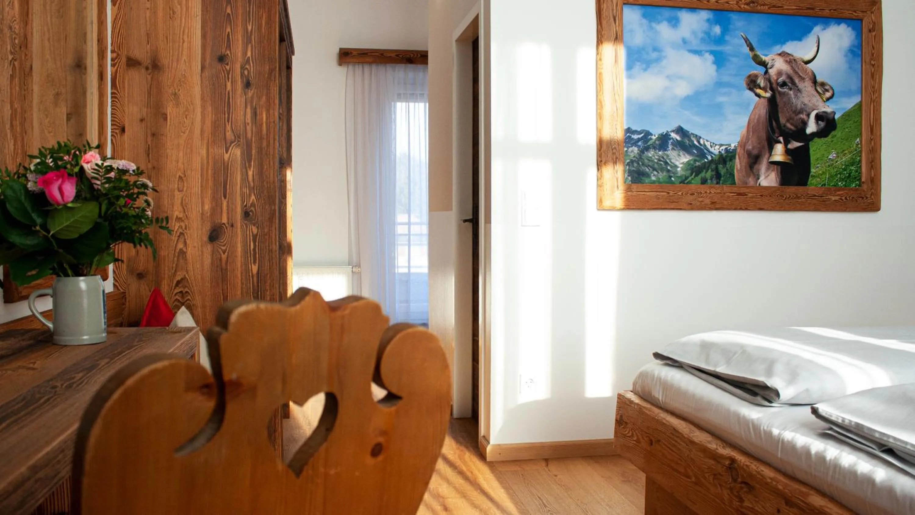 Seating area, Bed in Hotel Almwirt
