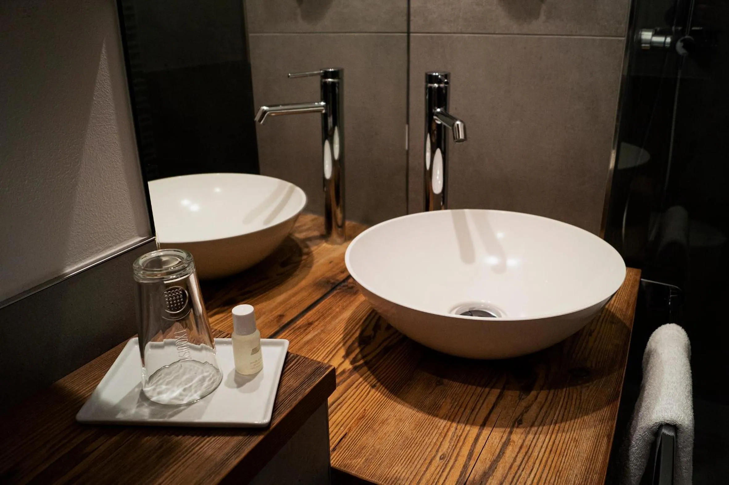 Bathroom in Hotel Almwirt