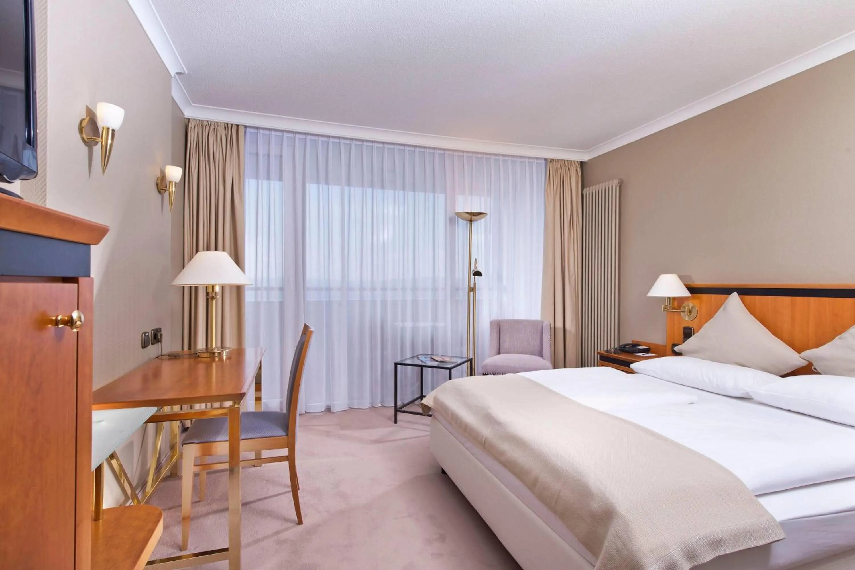 Photo of the whole room, Bed in Wyndham Garden Lahnstein Koblenz