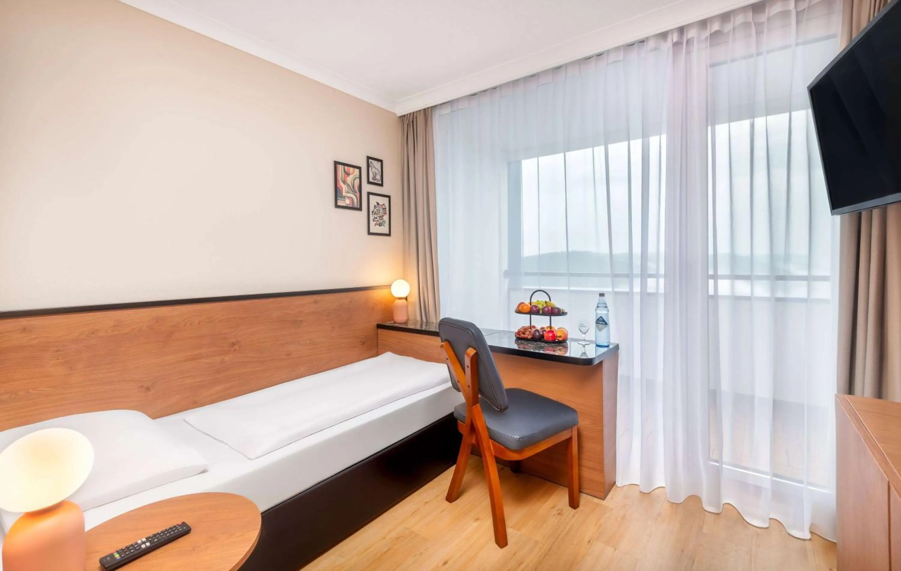 Photo of the whole room, Bed in Wyndham Garden Lahnstein Koblenz