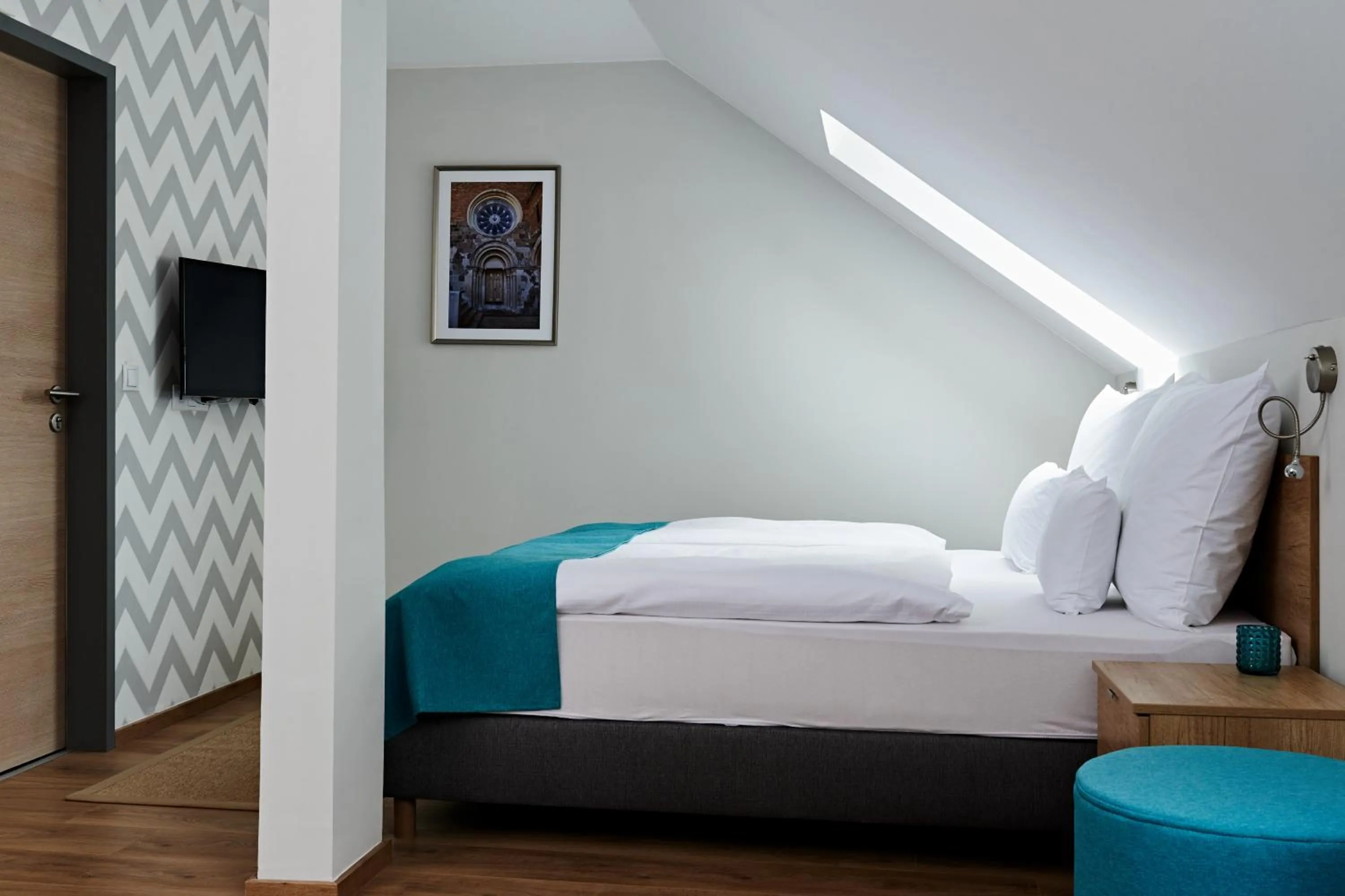 Bed in Hotel Adalbert Szent Tamás ház