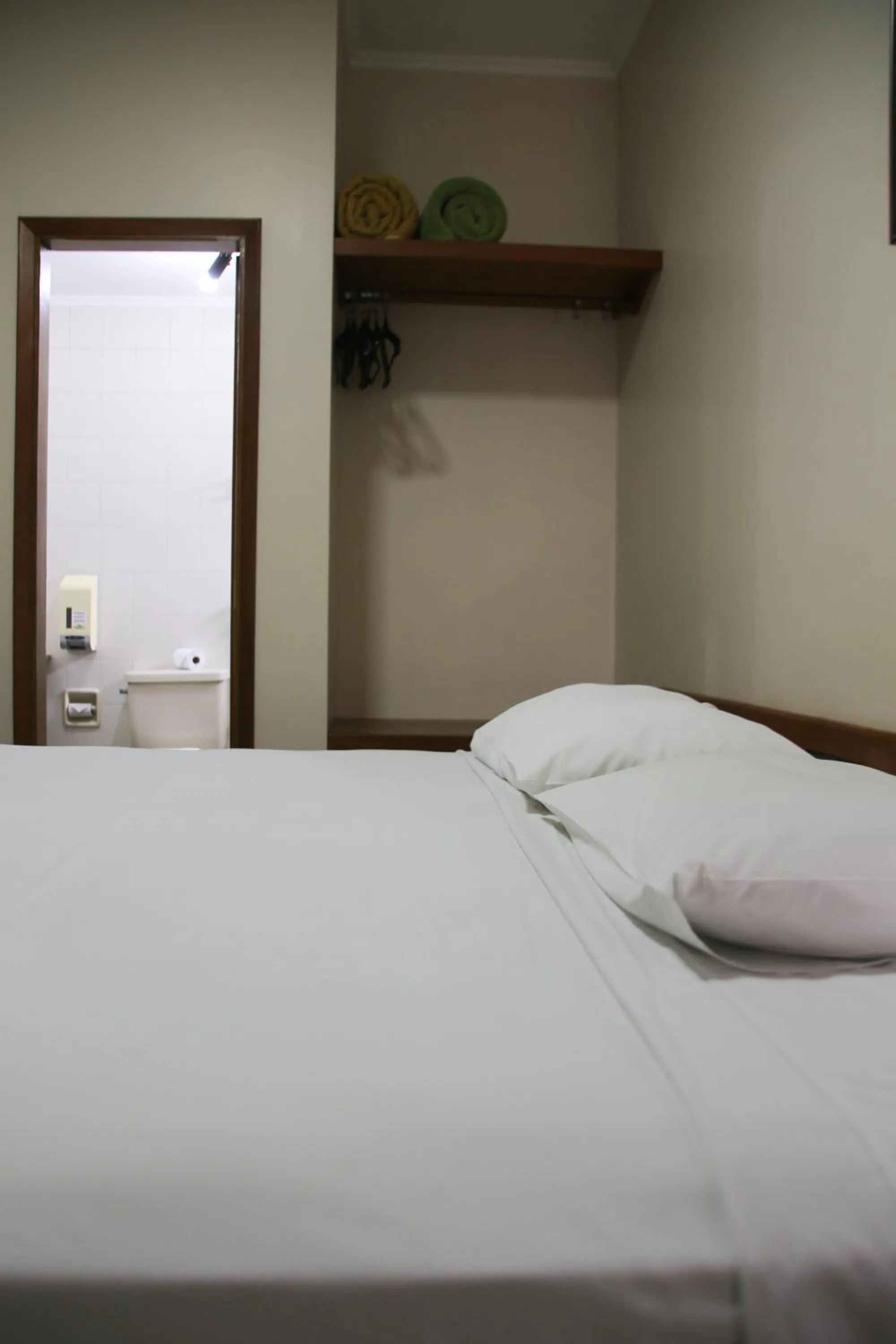 Bed in Pousada Água Eterna