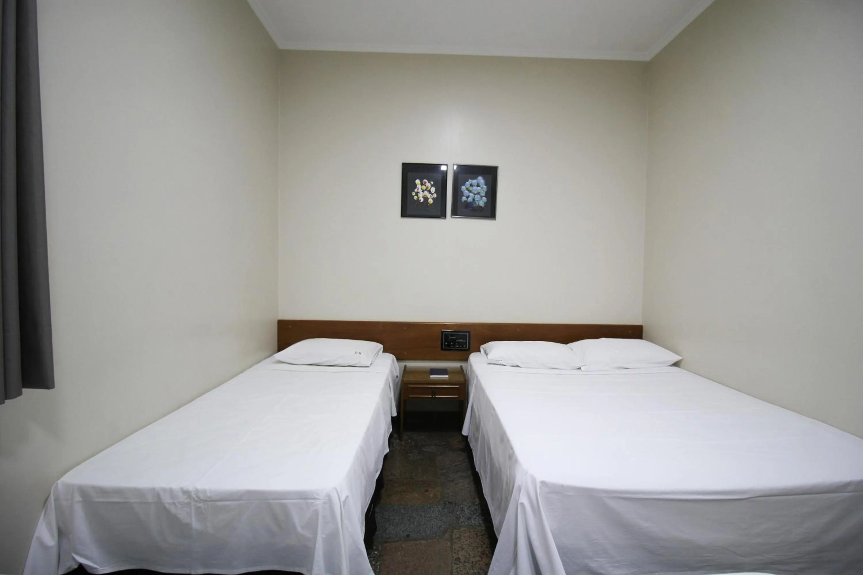 Bed in Pousada Água Eterna