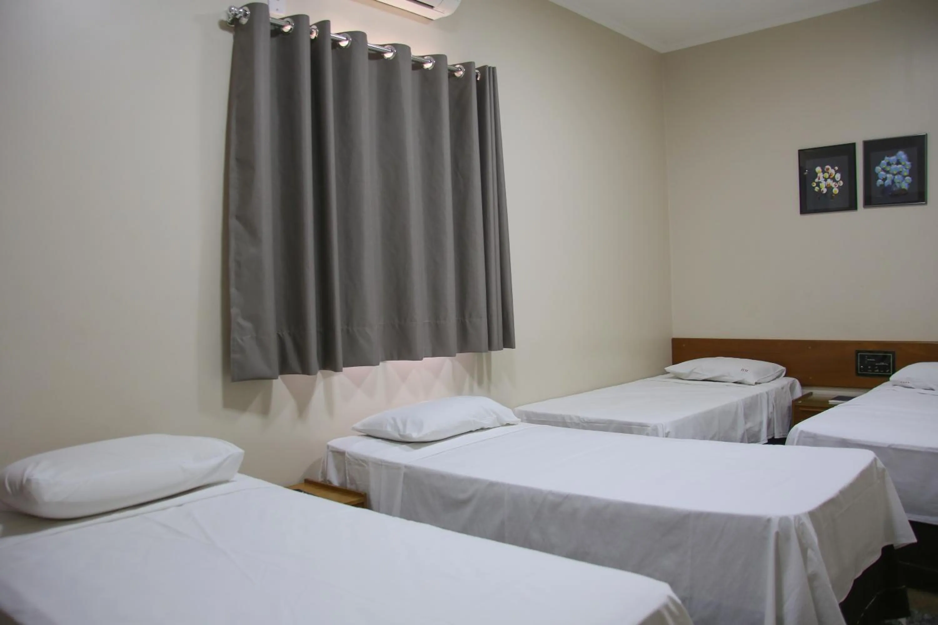 Bed in Pousada Água Eterna