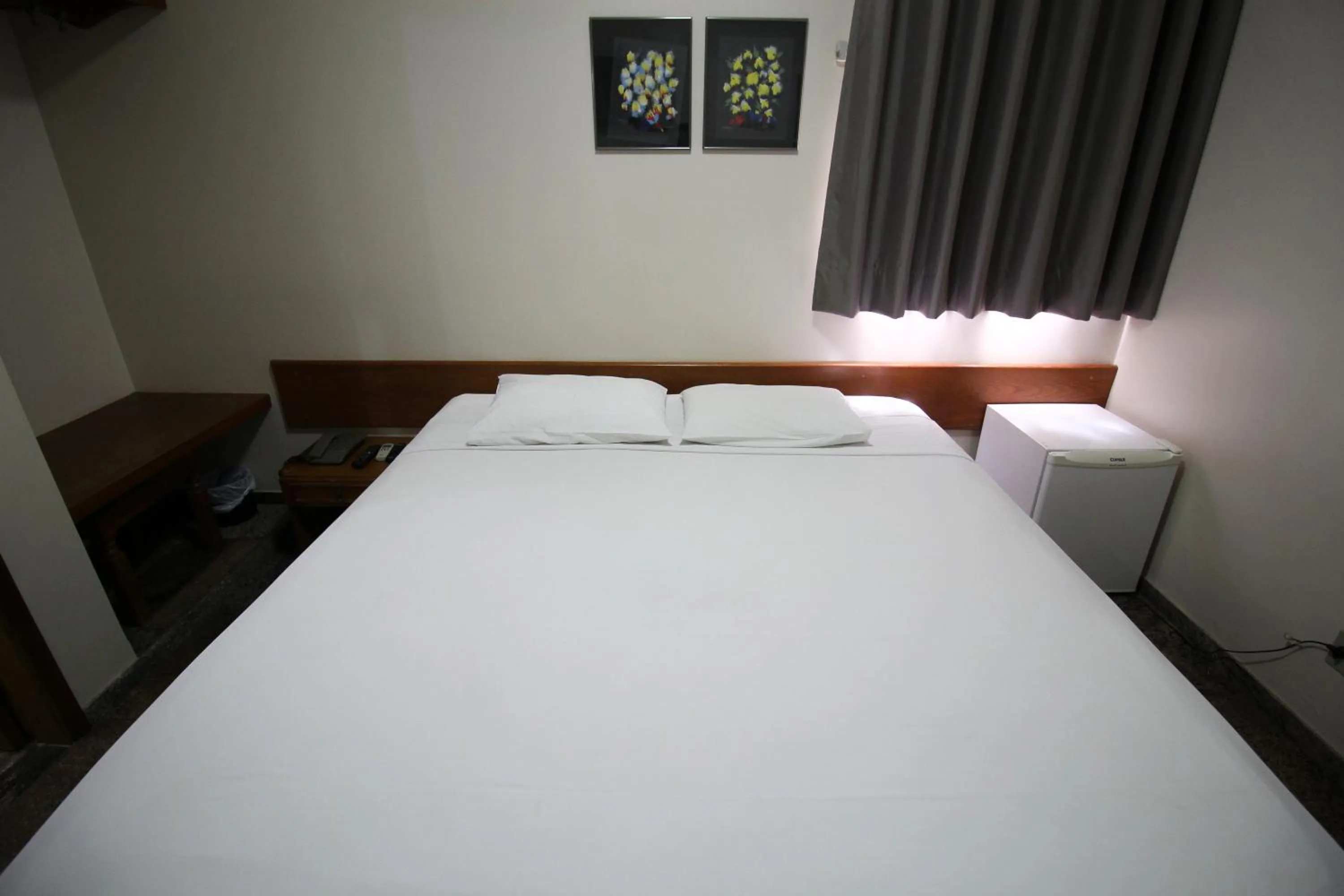 Bed in Pousada Água Eterna