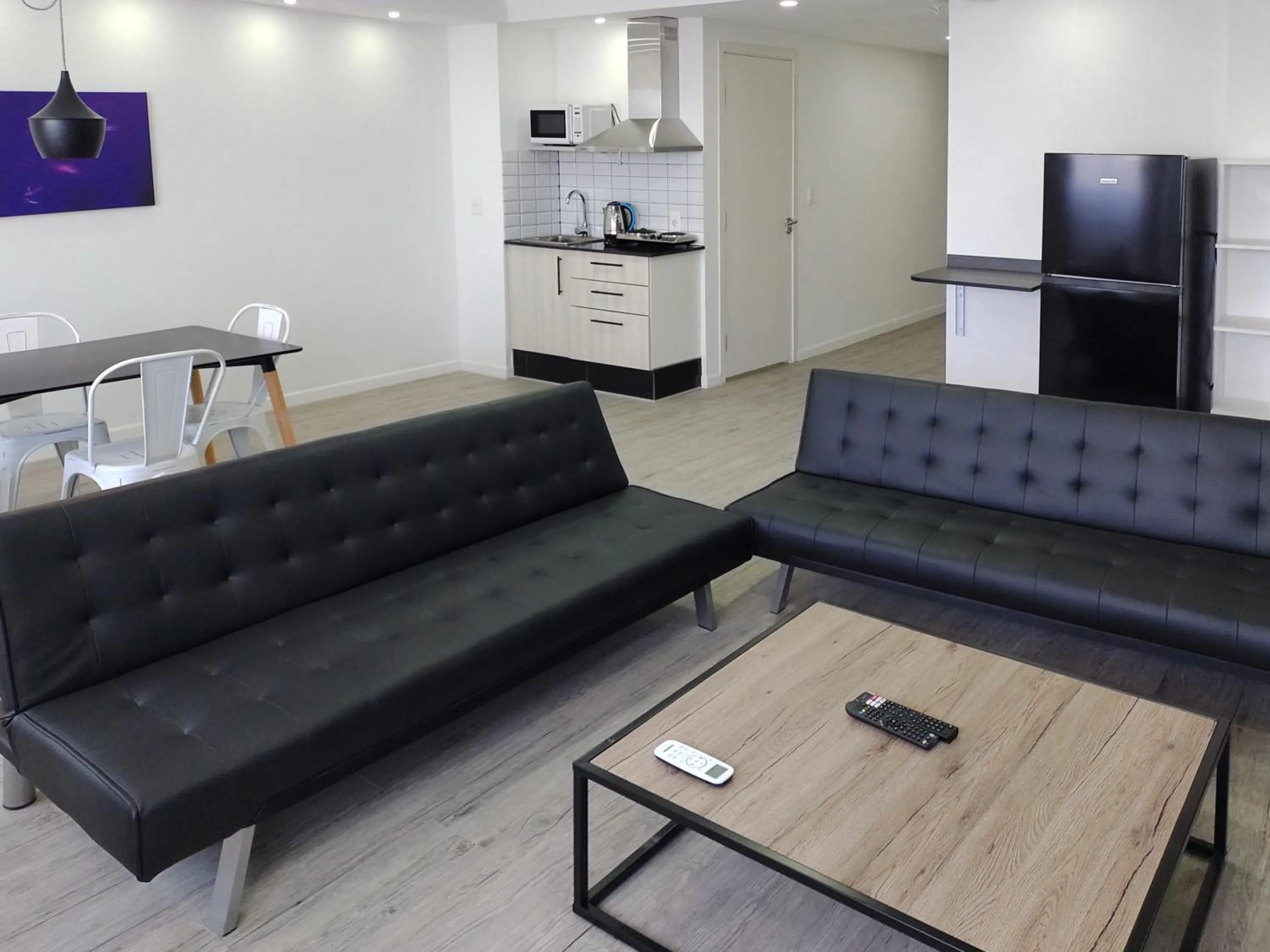 Living room in Quijano Hotel - Aparts & Suites