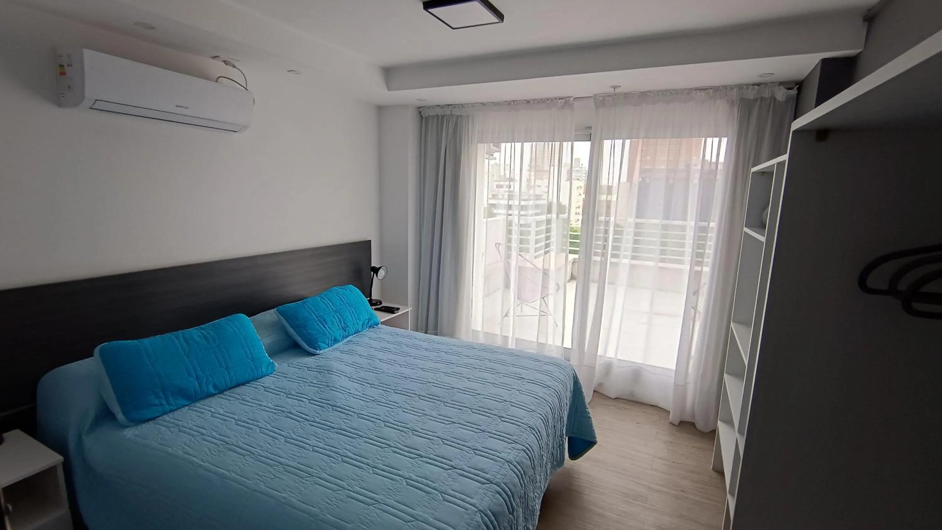 Bed in Quijano Hotel - Aparts & Suites