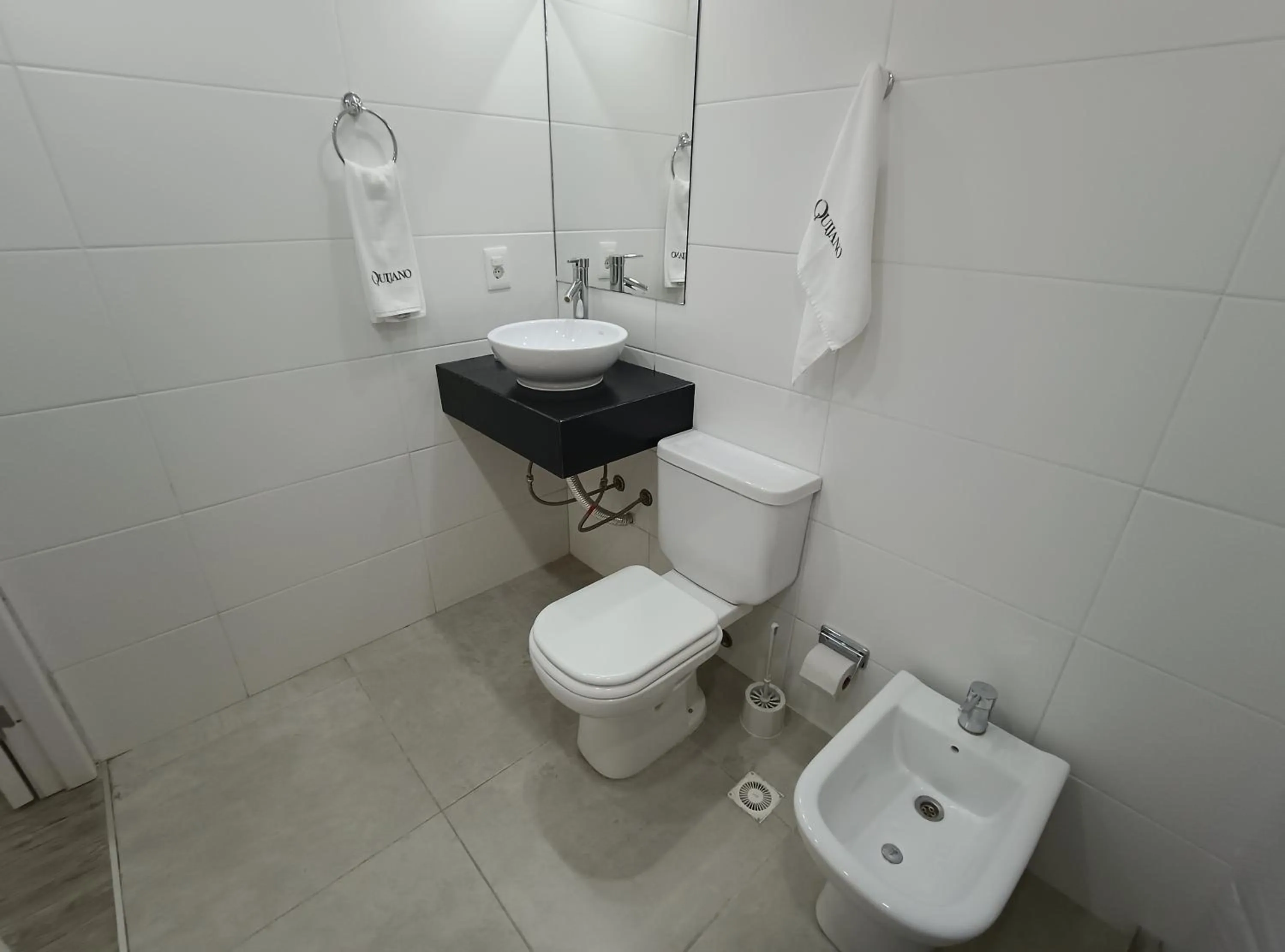 Bathroom in Quijano Hotel - Aparts & Suites