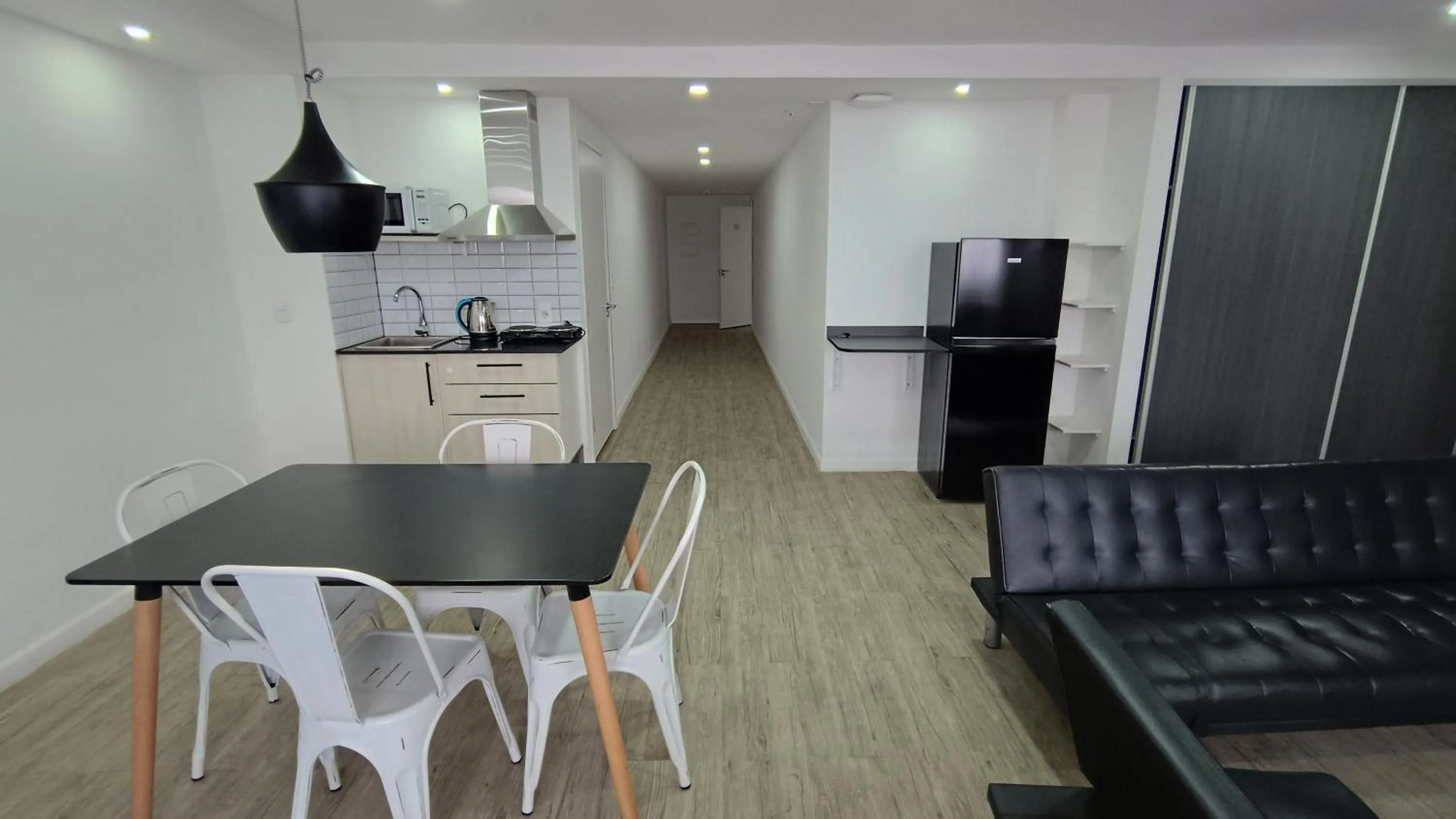 Kitchen or kitchenette in Quijano Hotel - Aparts & Suites