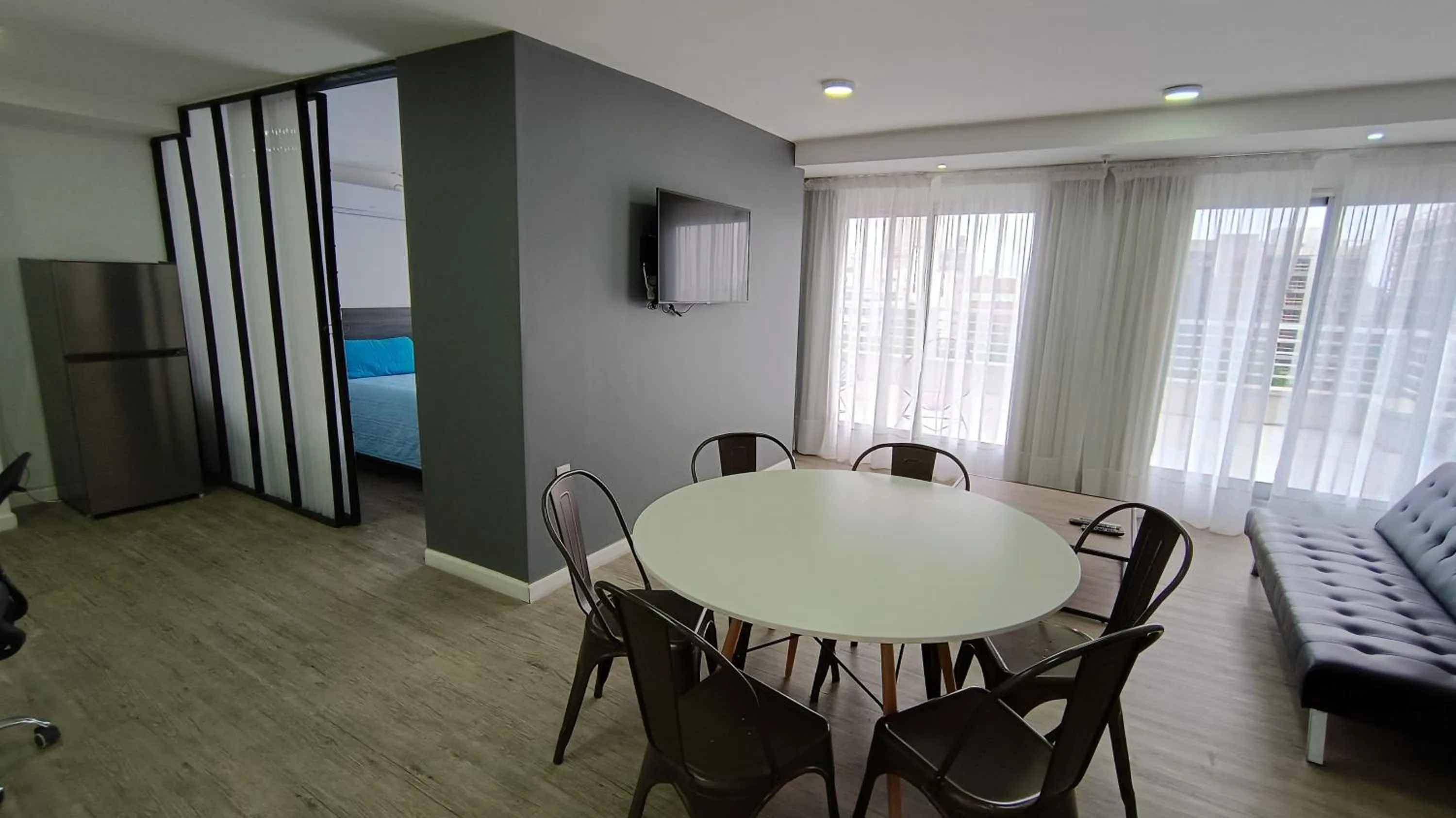 Communal lounge/ TV room in Quijano Hotel - Aparts & Suites