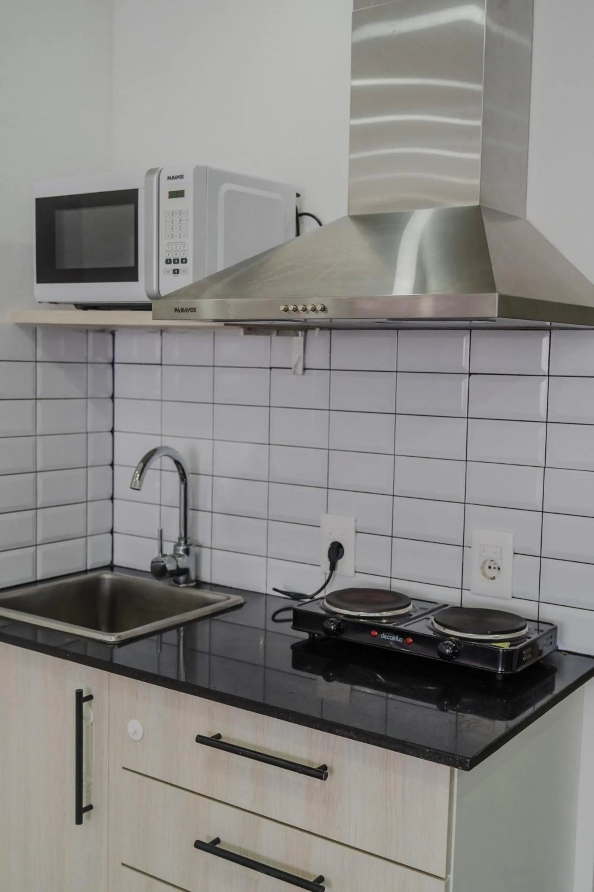 Kitchen or kitchenette in Quijano Hotel - Aparts & Suites