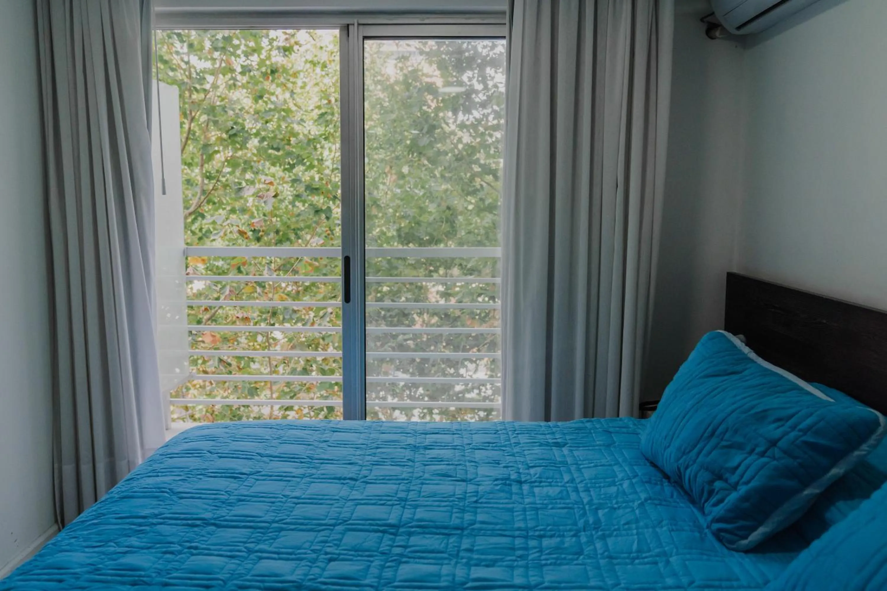 Bed in Quijano Hotel - Aparts & Suites