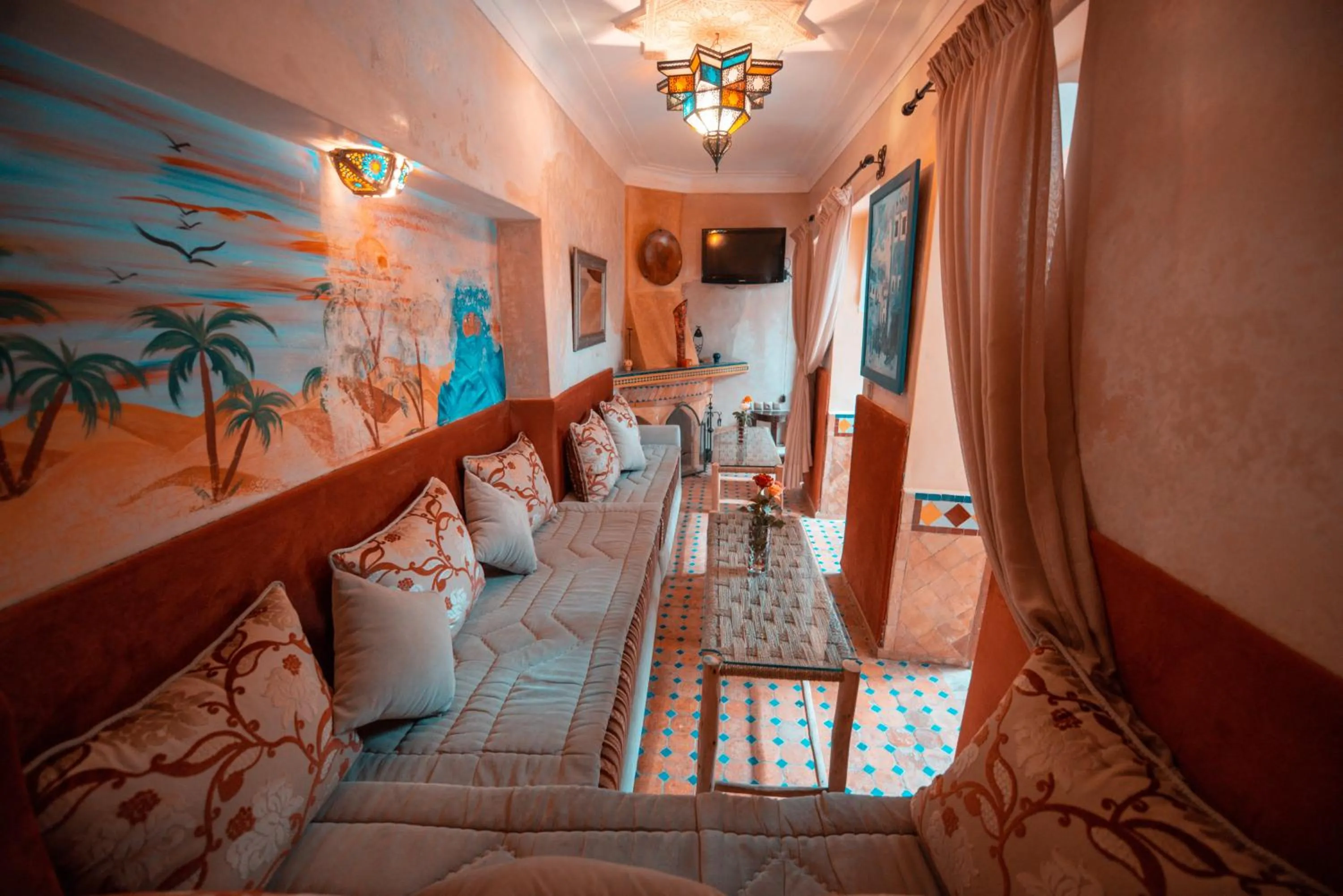 Communal lounge/ TV room in Riad Eva