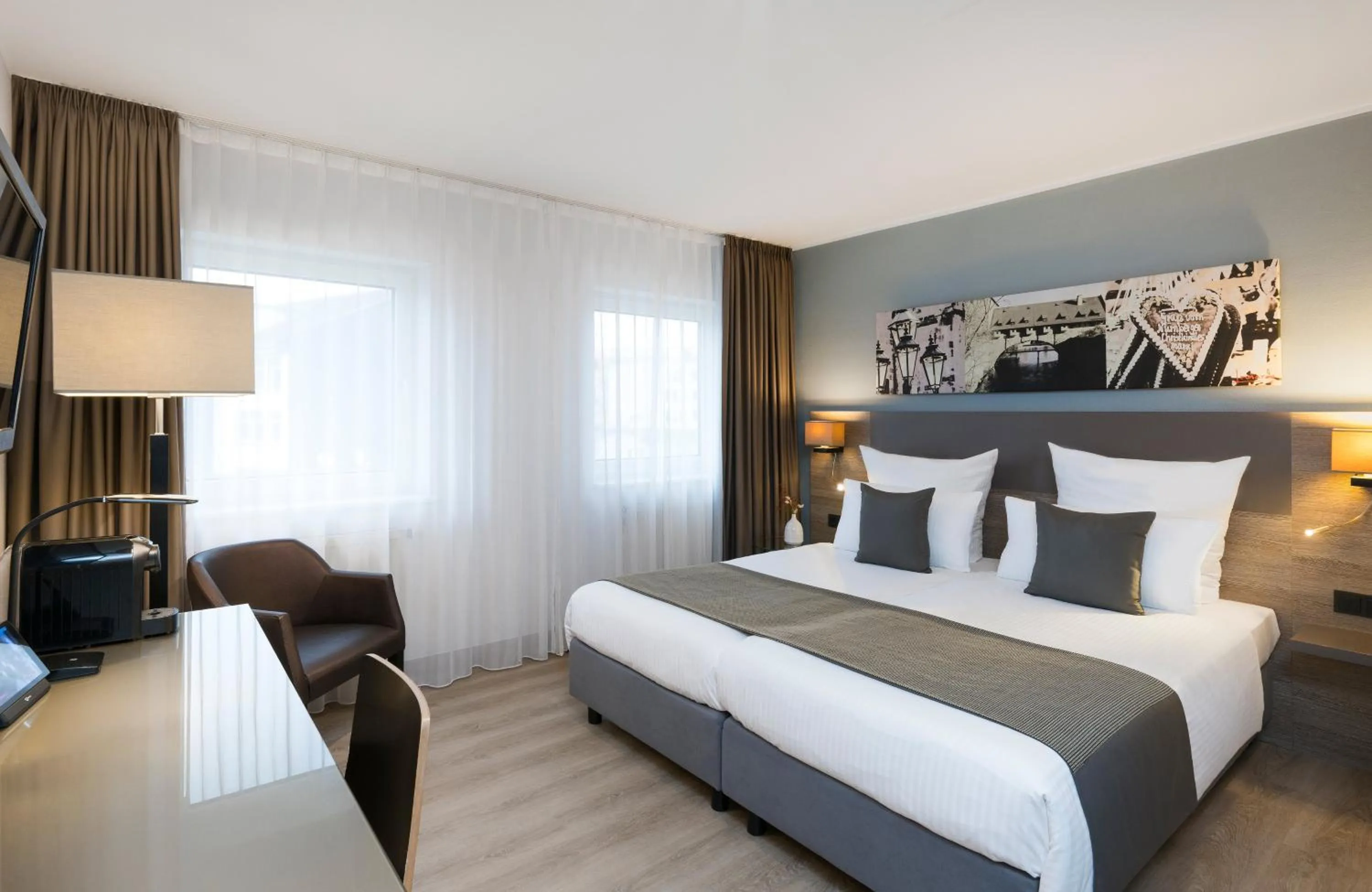 Photo of the whole room, Bed in Leonardo Hotel Nürnberg