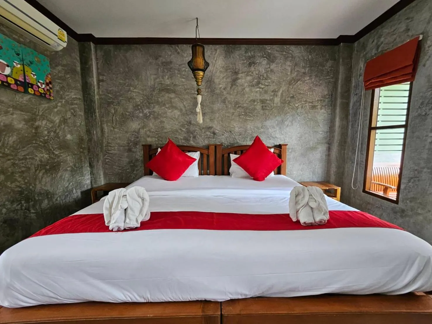 Bed in Araya Boutique Hotel