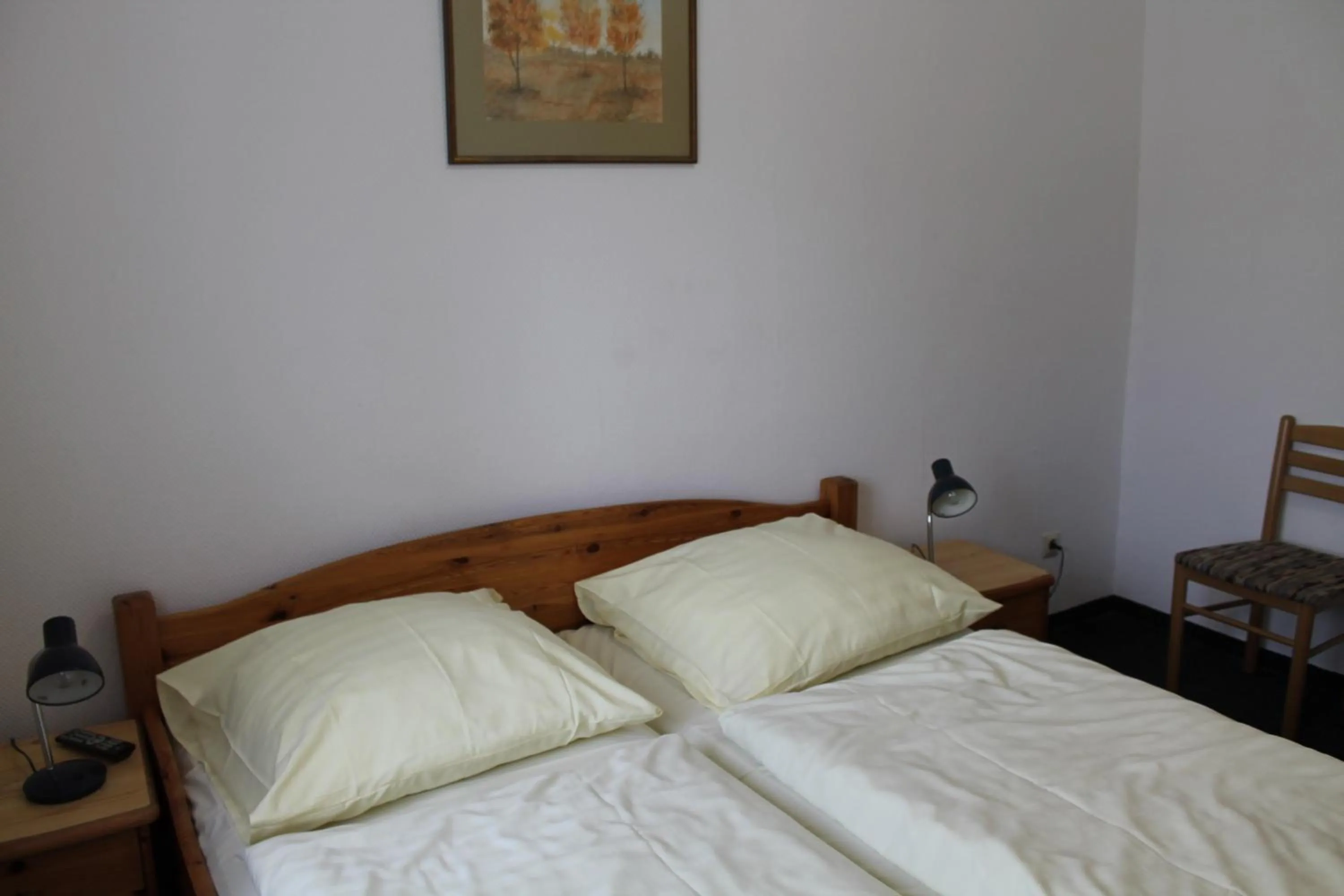 Bed in Pension Locarno
