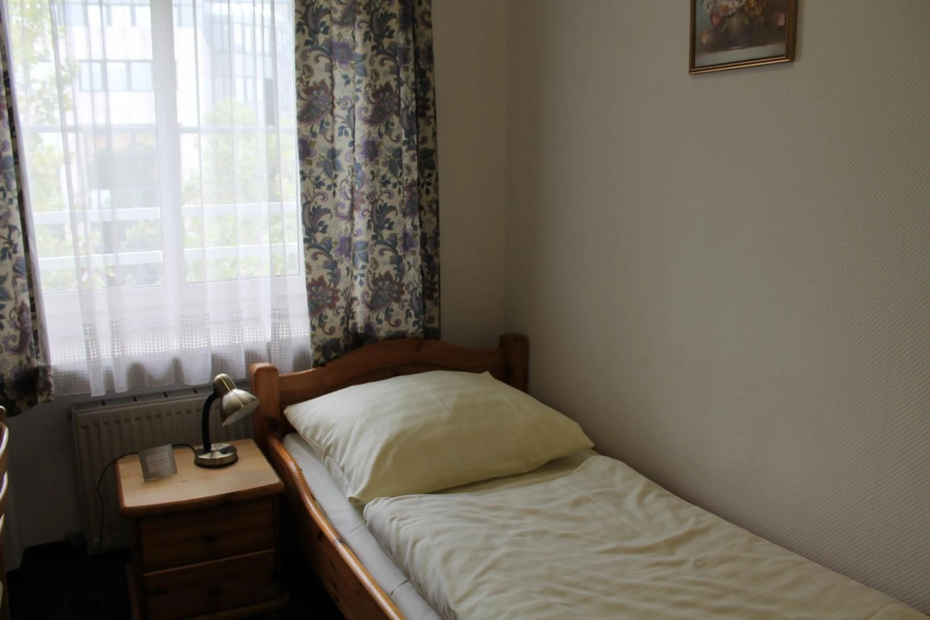 Bed in Pension Locarno