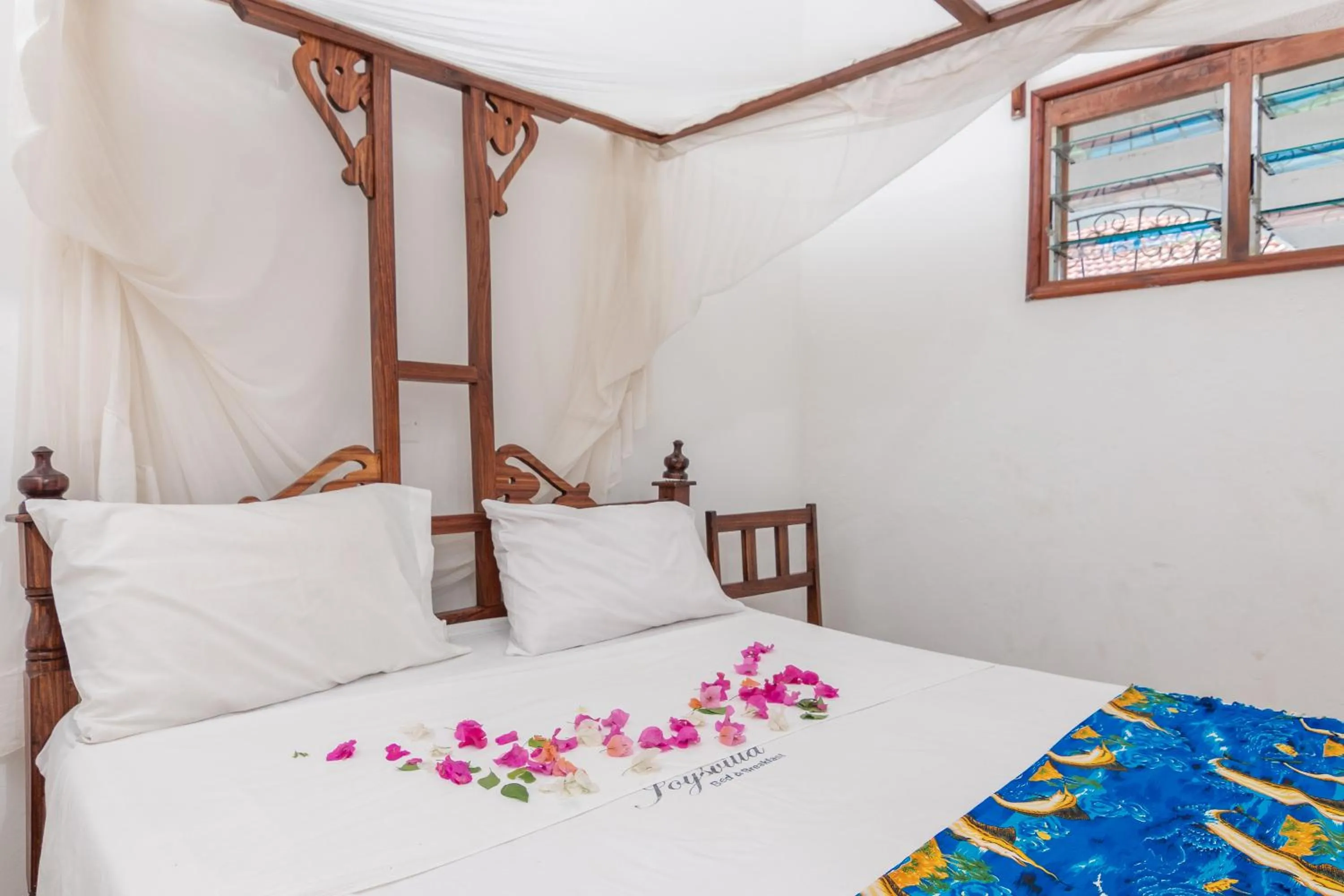 Bed in JoysVilla Family Holiday Home