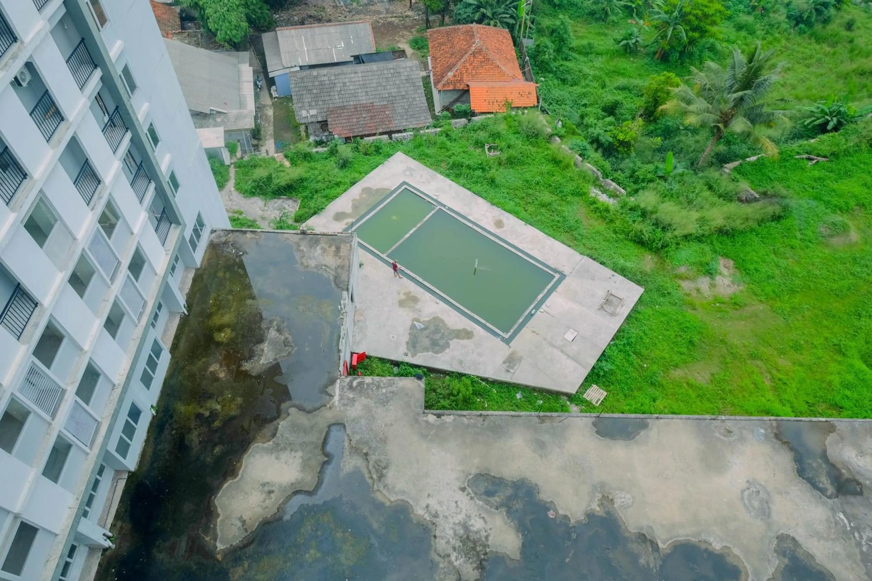 Property building in Comfy Studio Bogorienze Apartment near The Jungle Fest By Travelio