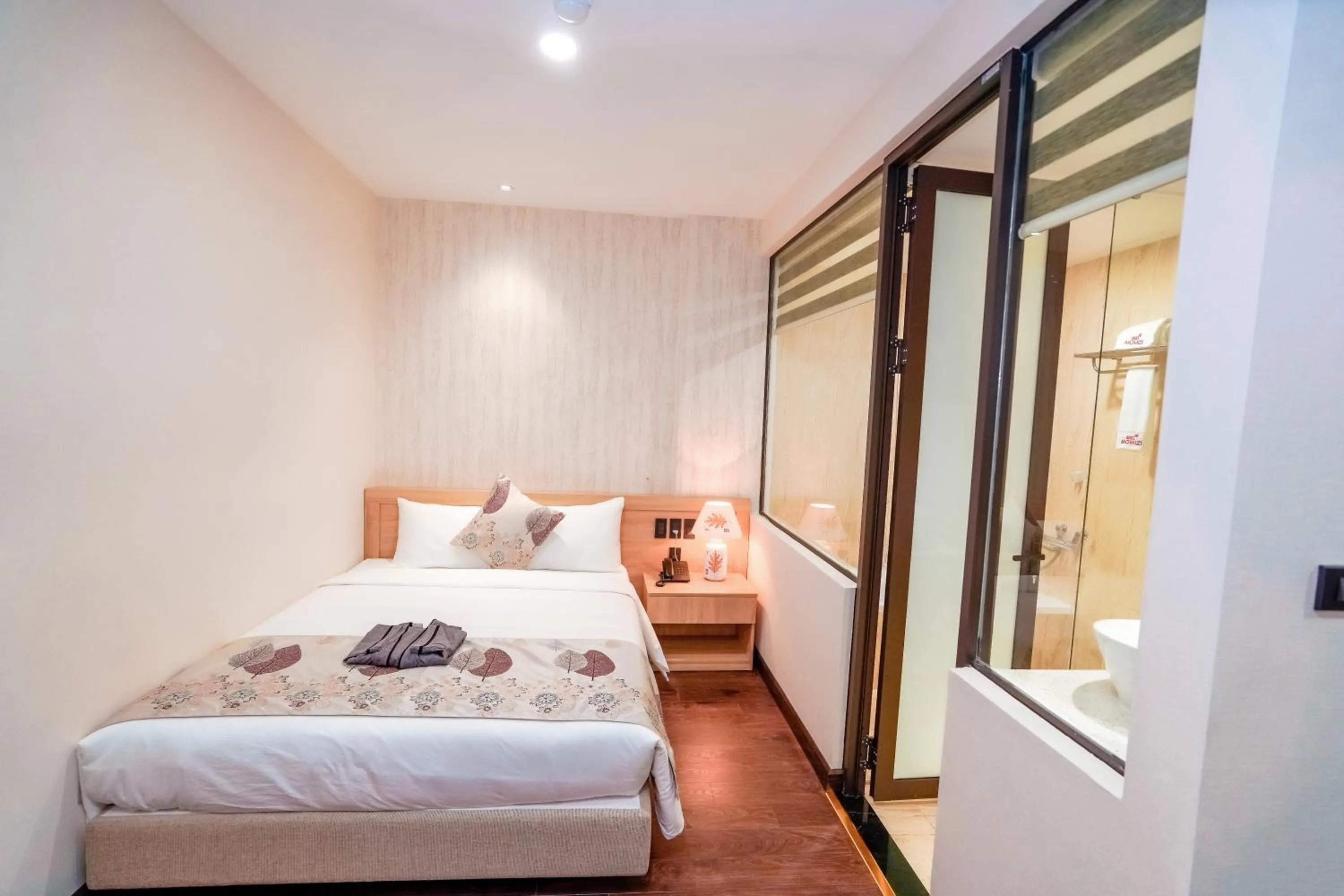 Bed in MOMIZI Hotel HAI PHONG