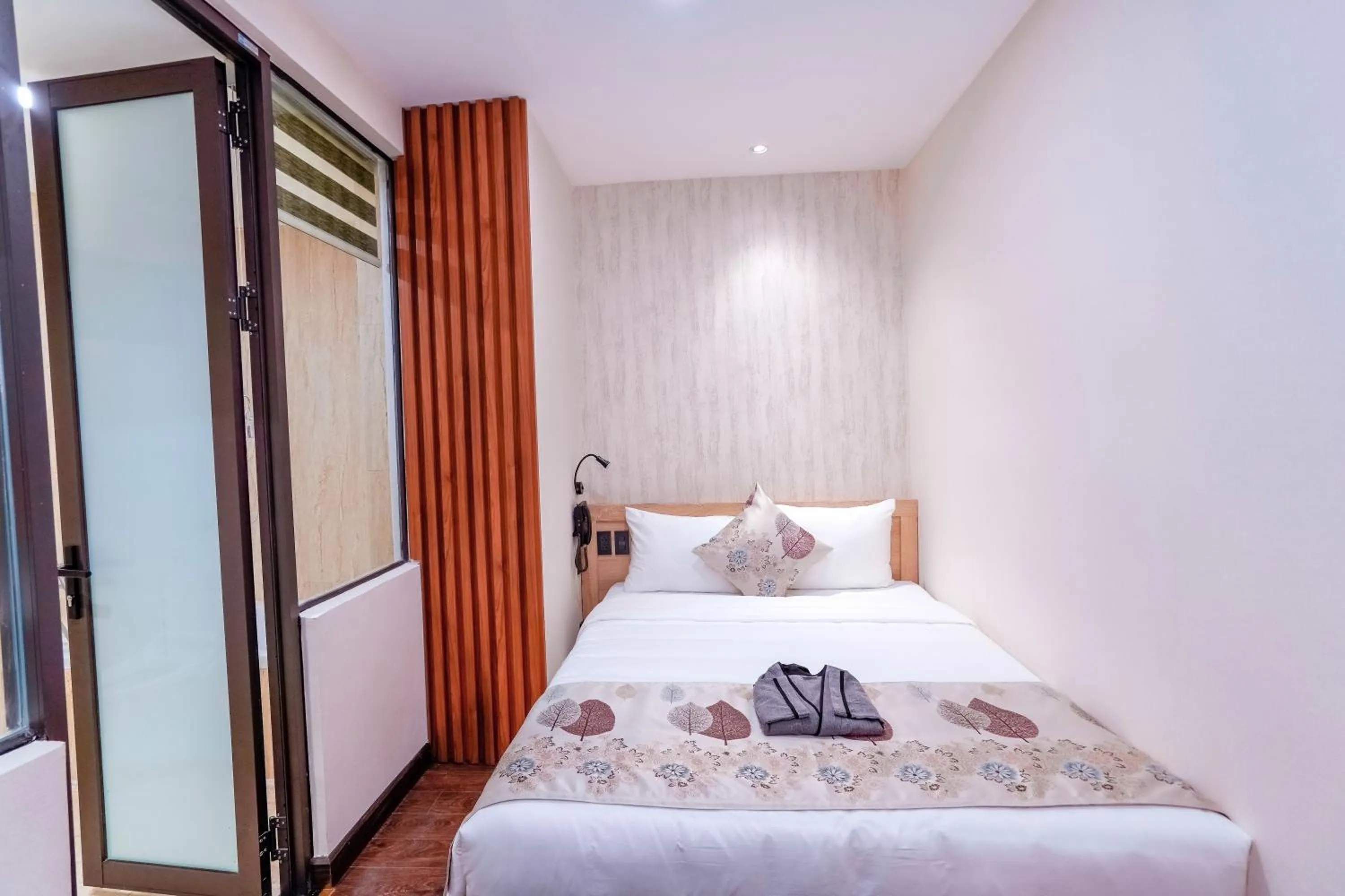 Bed in MOMIZI Hotel HAI PHONG