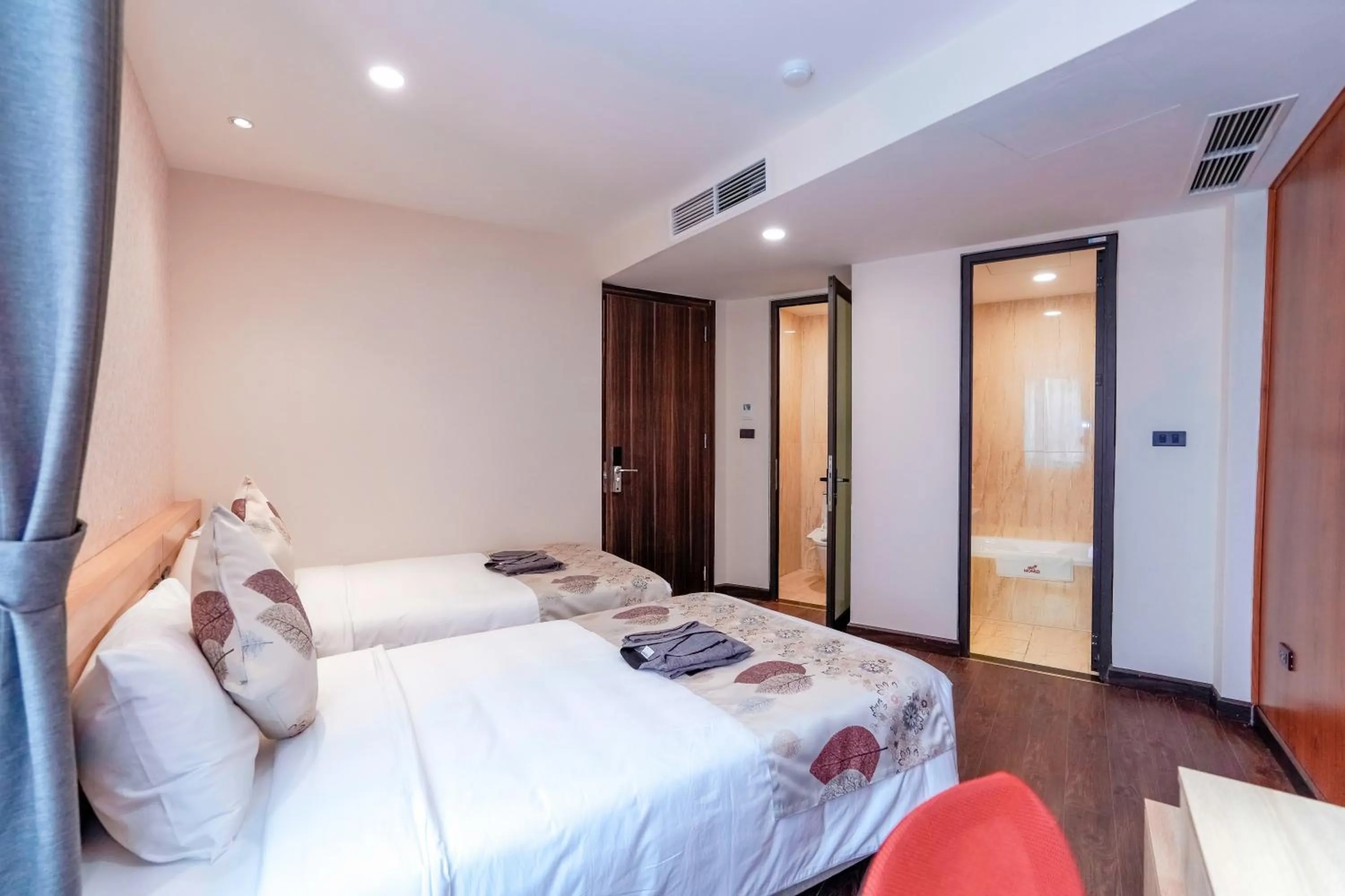 Bed in MOMIZI Hotel HAI PHONG