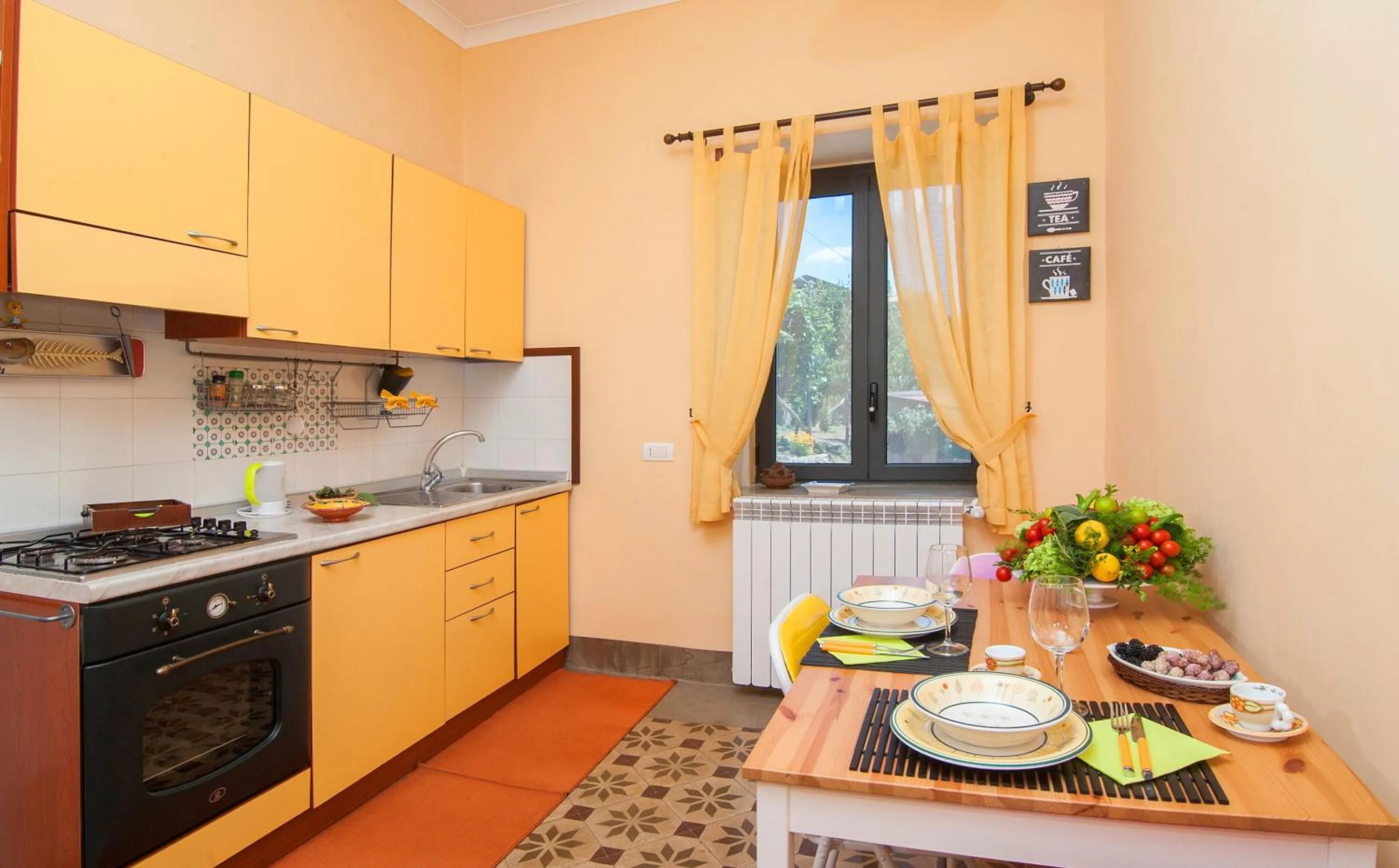 Kitchen or kitchenette in Casa Vacanze Li Galli