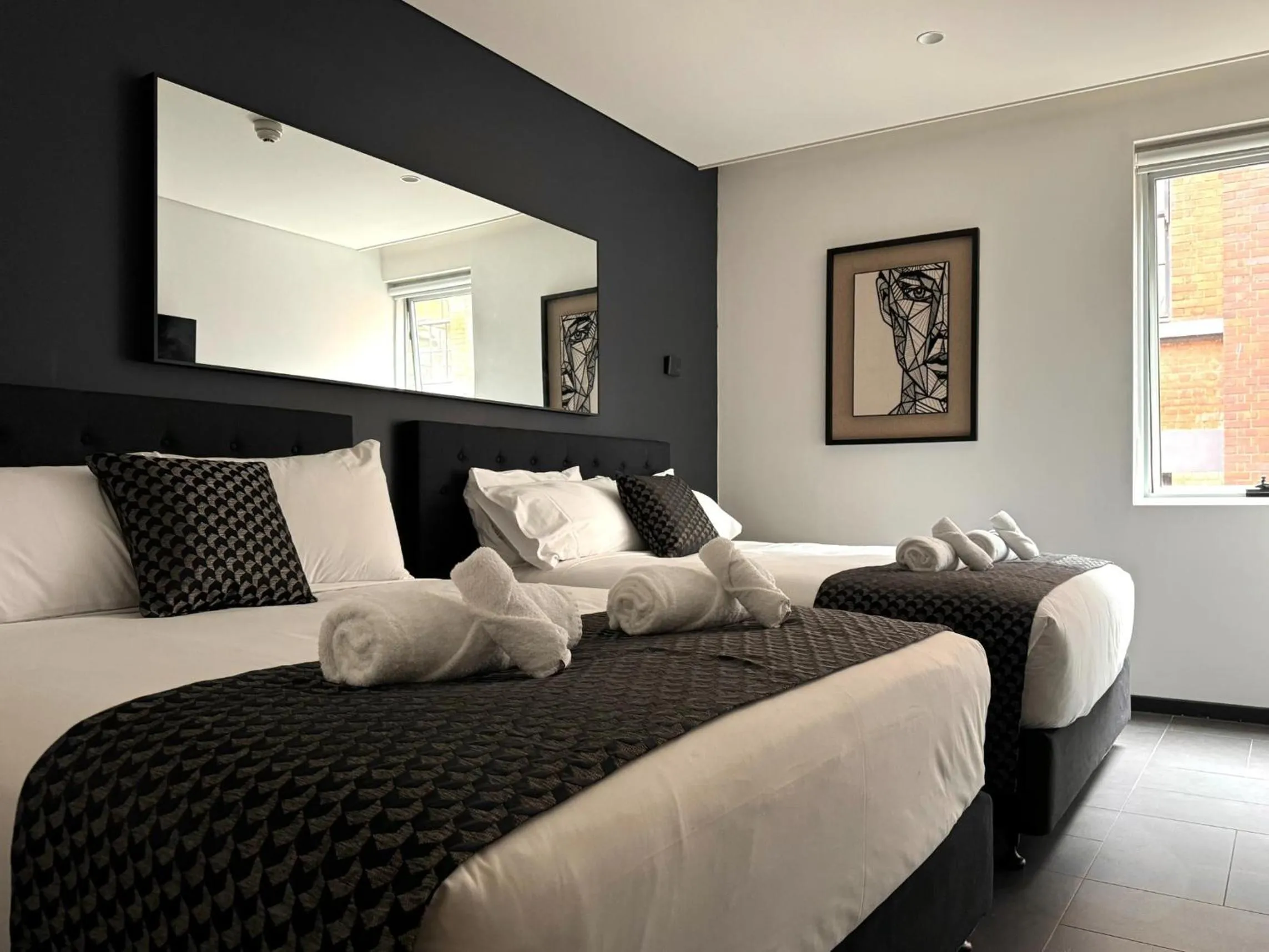 Photo of the whole room, Bed in Spice On Broadway