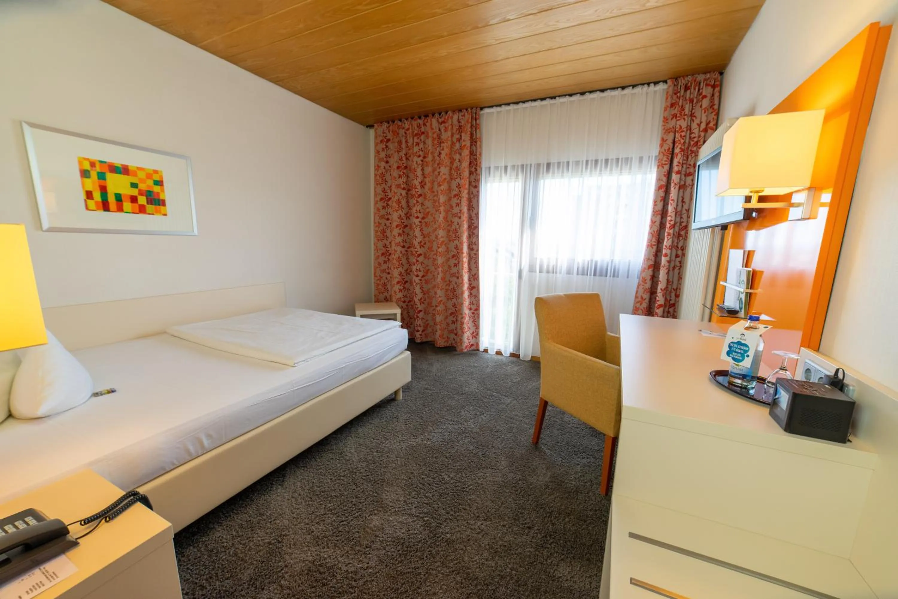 Photo of the whole room, Bed in Stadt-gut-Hotel Filderhotel