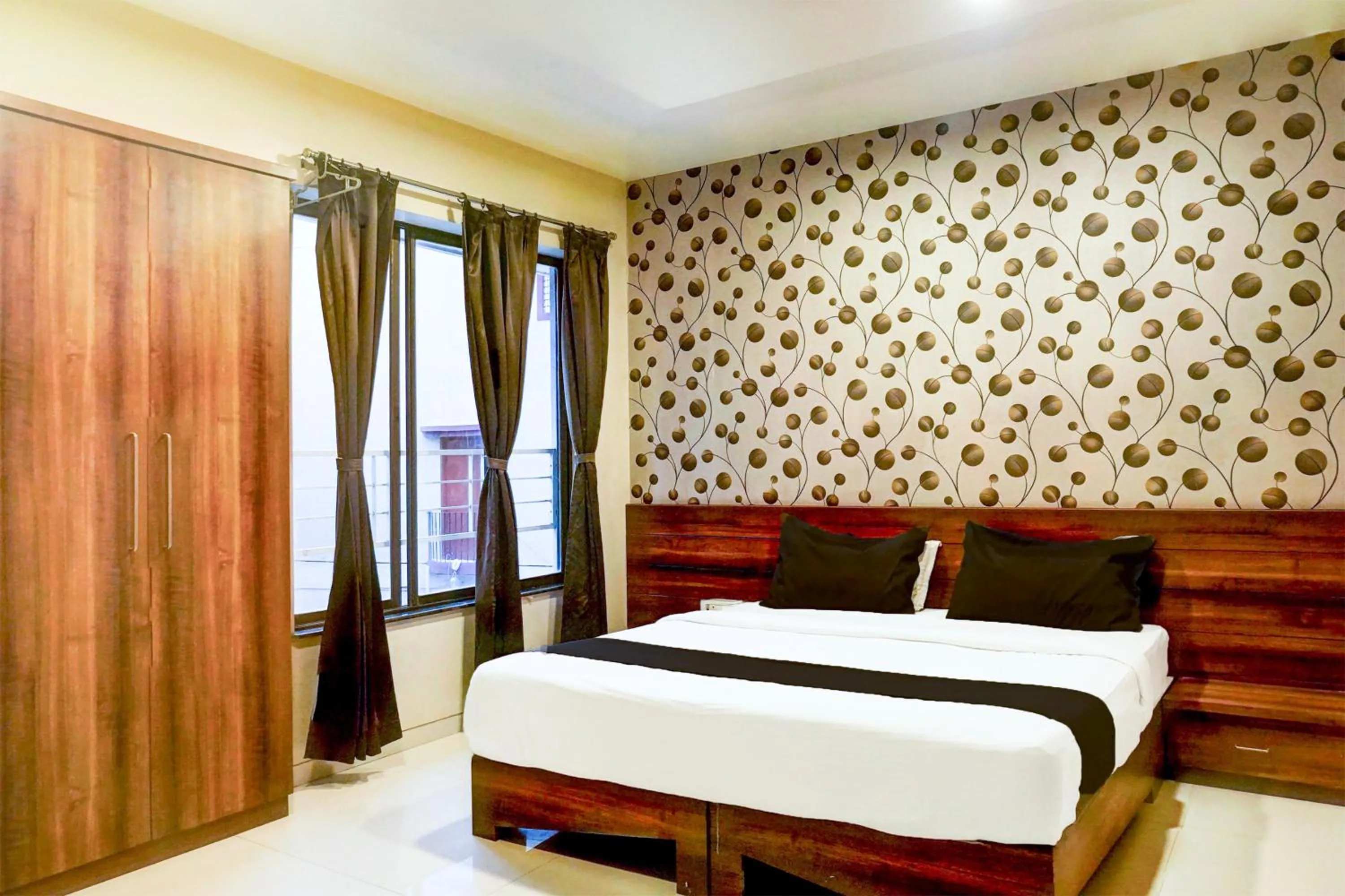 Bedroom, Bed in Super Townhouse Oak Viman Nagar Formerly Kuber Inn
