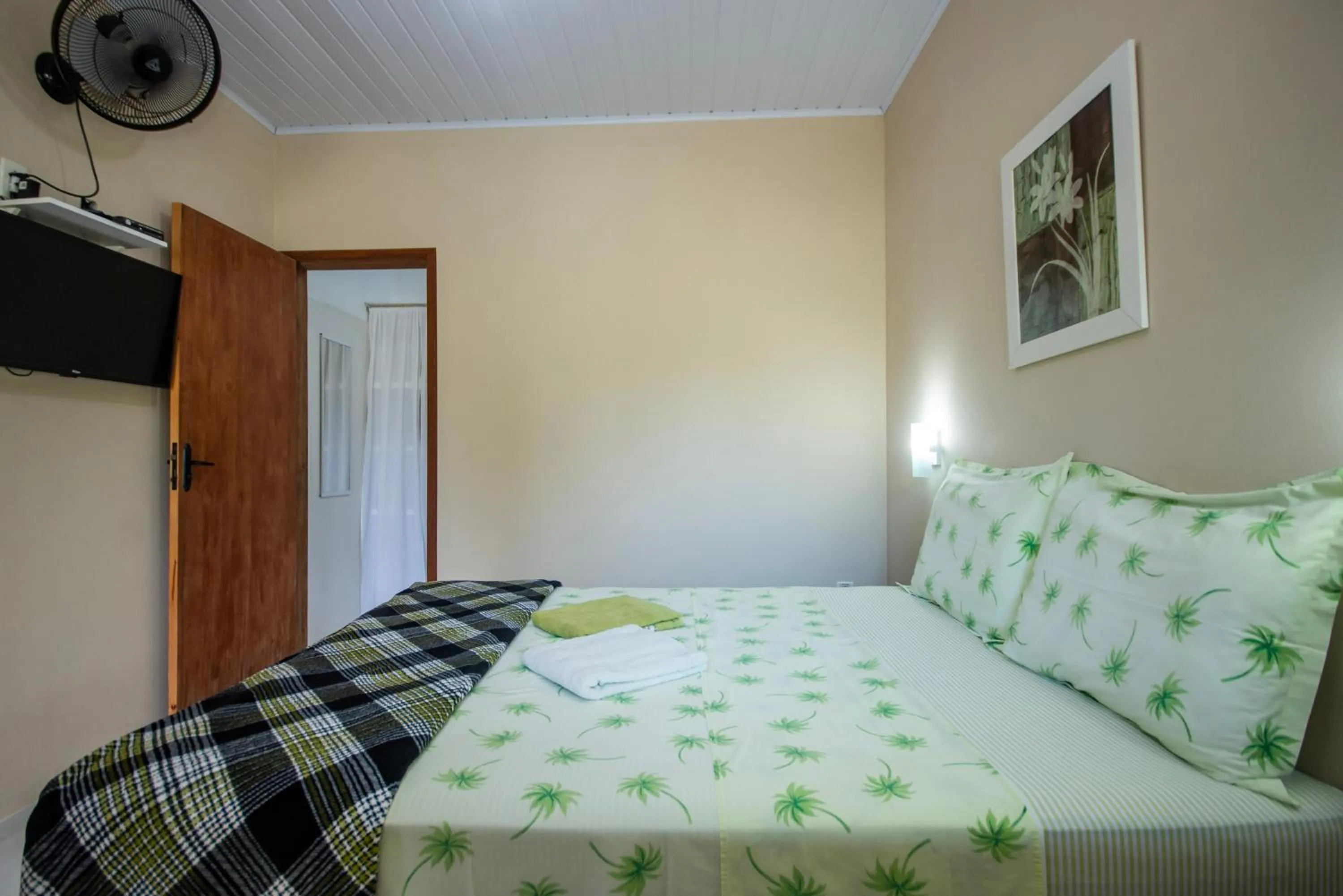 Bed in Pousada Quatro Estações Paraty