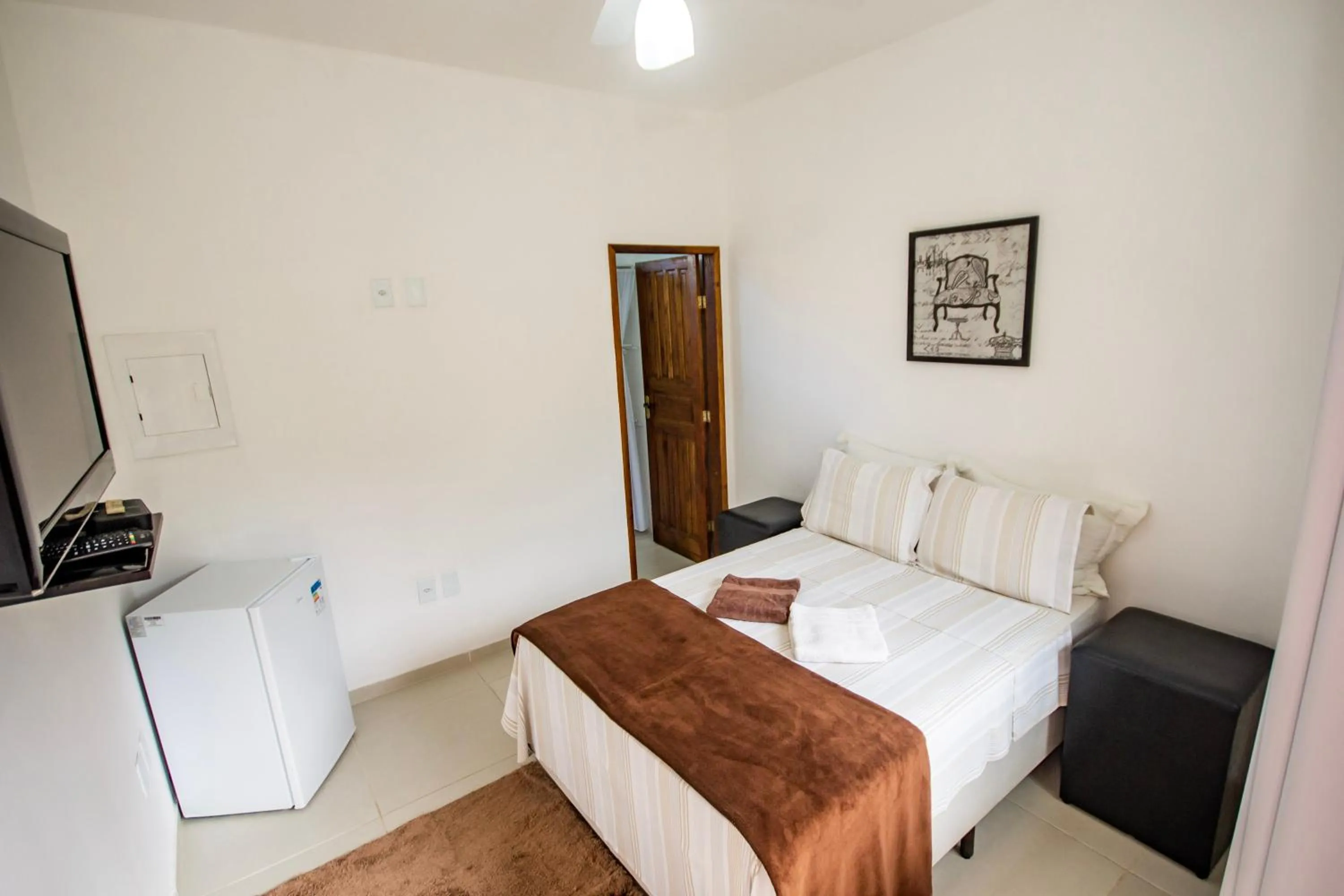 Bed in Pousada Quatro Estações Paraty