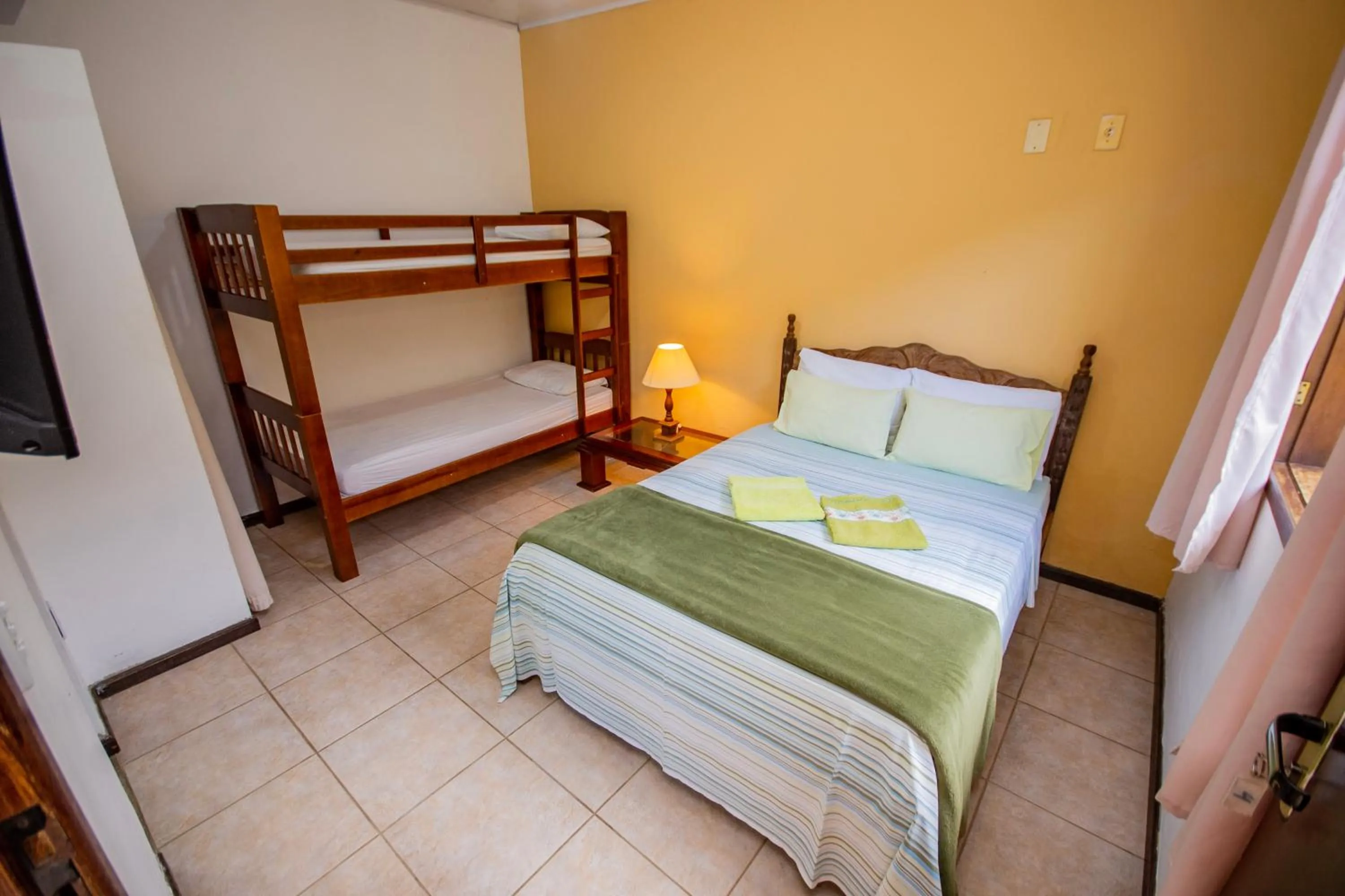 Photo of the whole room, Bed in Pousada Quatro Estações Paraty